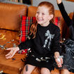 Robe pull avec d&eacute;tails sequins noir fille