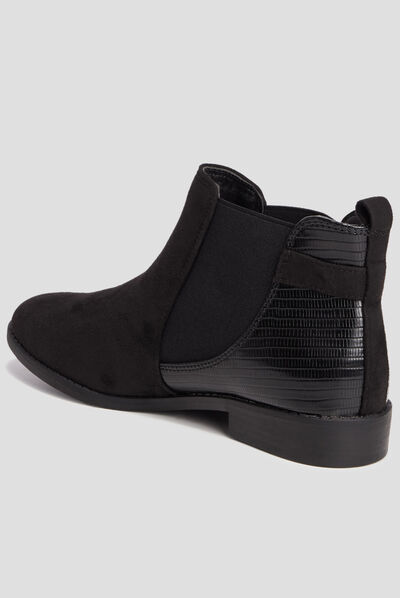 Bottines chelsea avec boucles noir femme