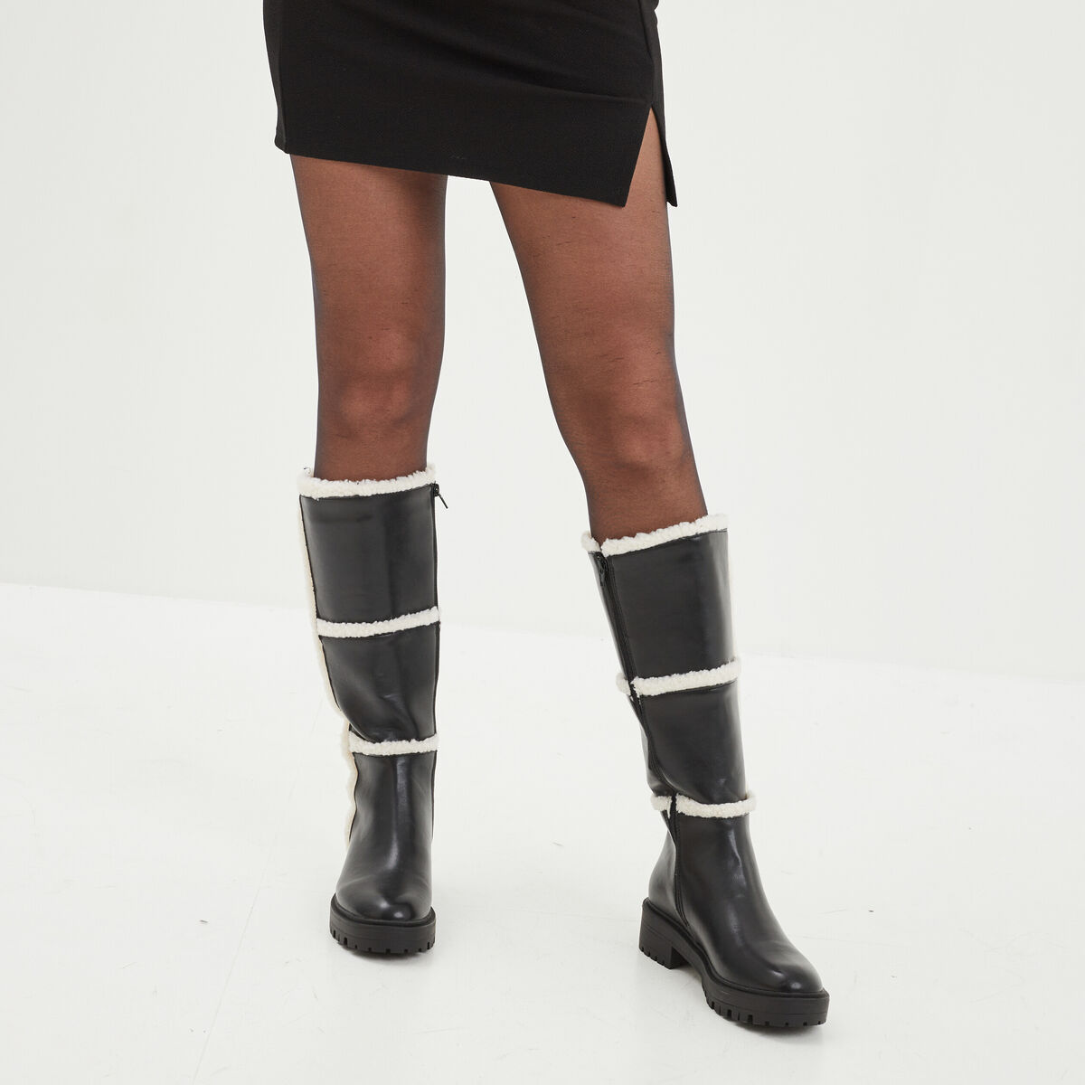 Bottes bandes fausse laine mouton noir femme