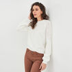 Pull manches ballons détails ajourés sable femme