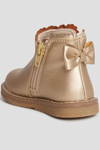 Bottines zippées avec noeud jaune or bébé fille