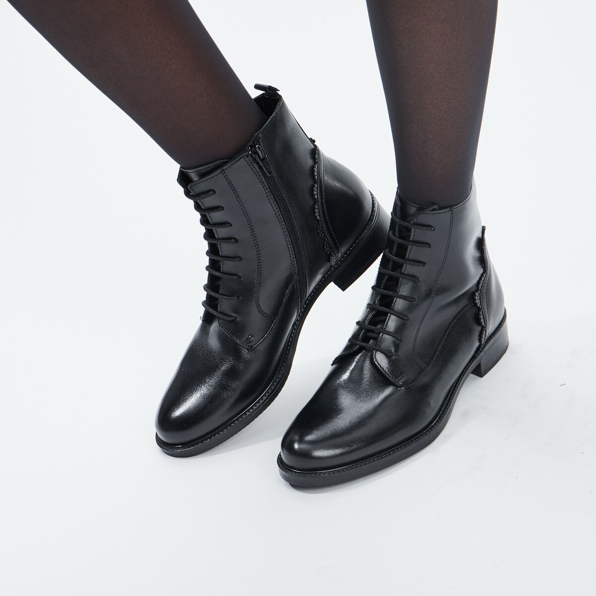 Bottines en cuir zippées noir femme