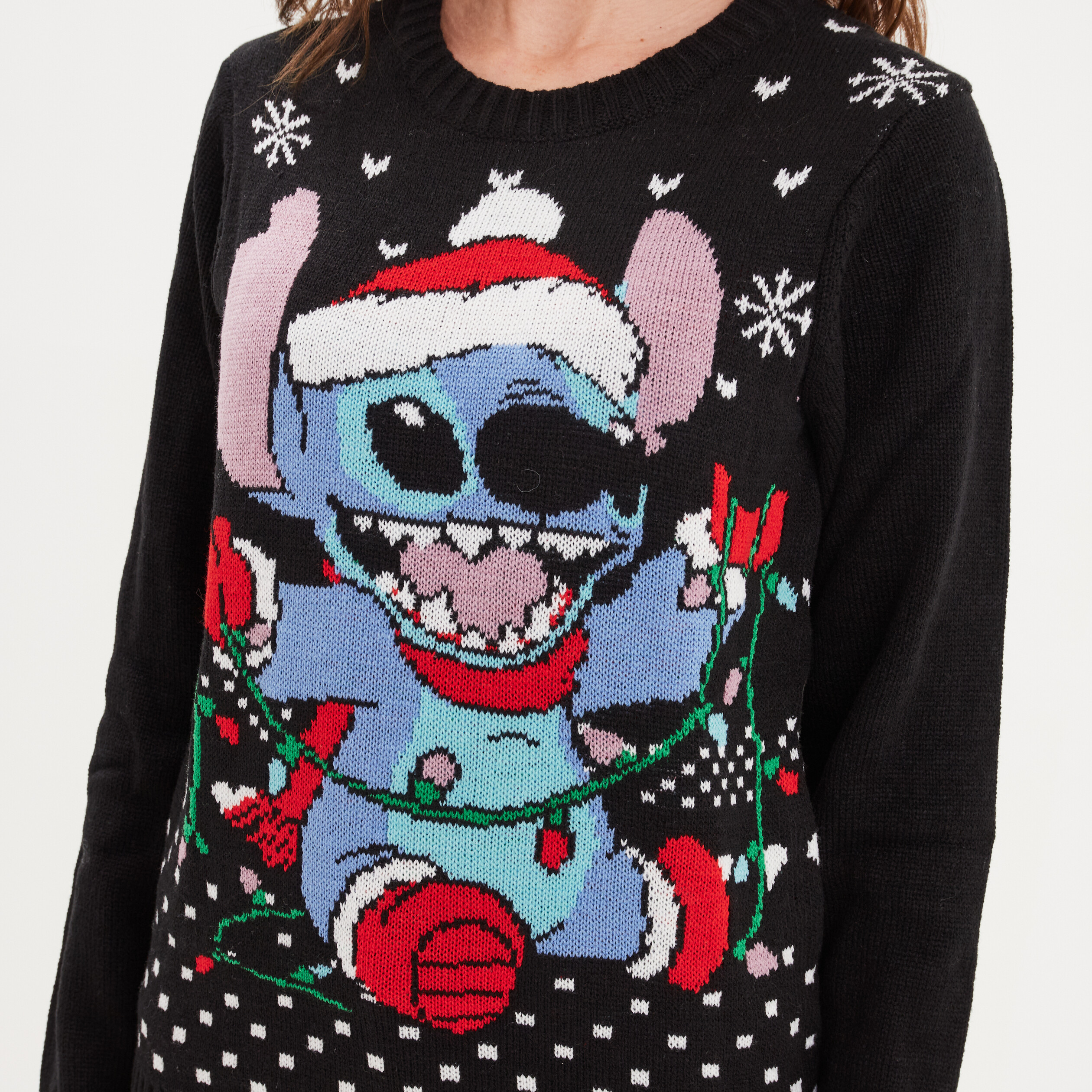 pull de noel col rond stitch noir femme Pull de Noël col rond Stitch noir femme