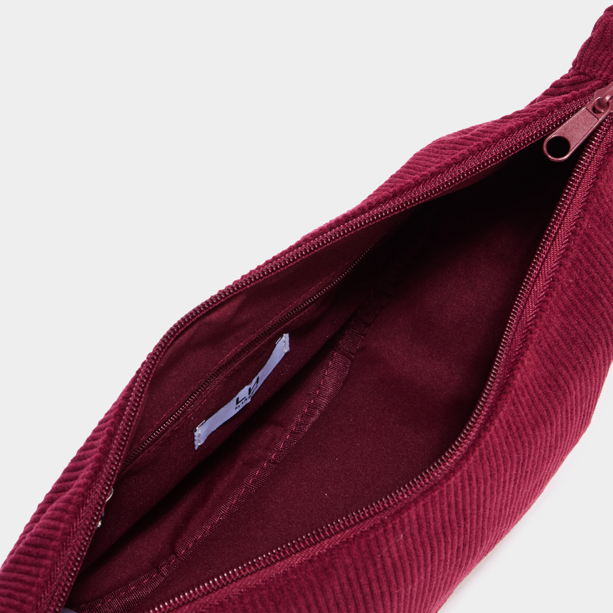 Sac banane effet velours c&ocirc;tel&eacute; bordeaux femme