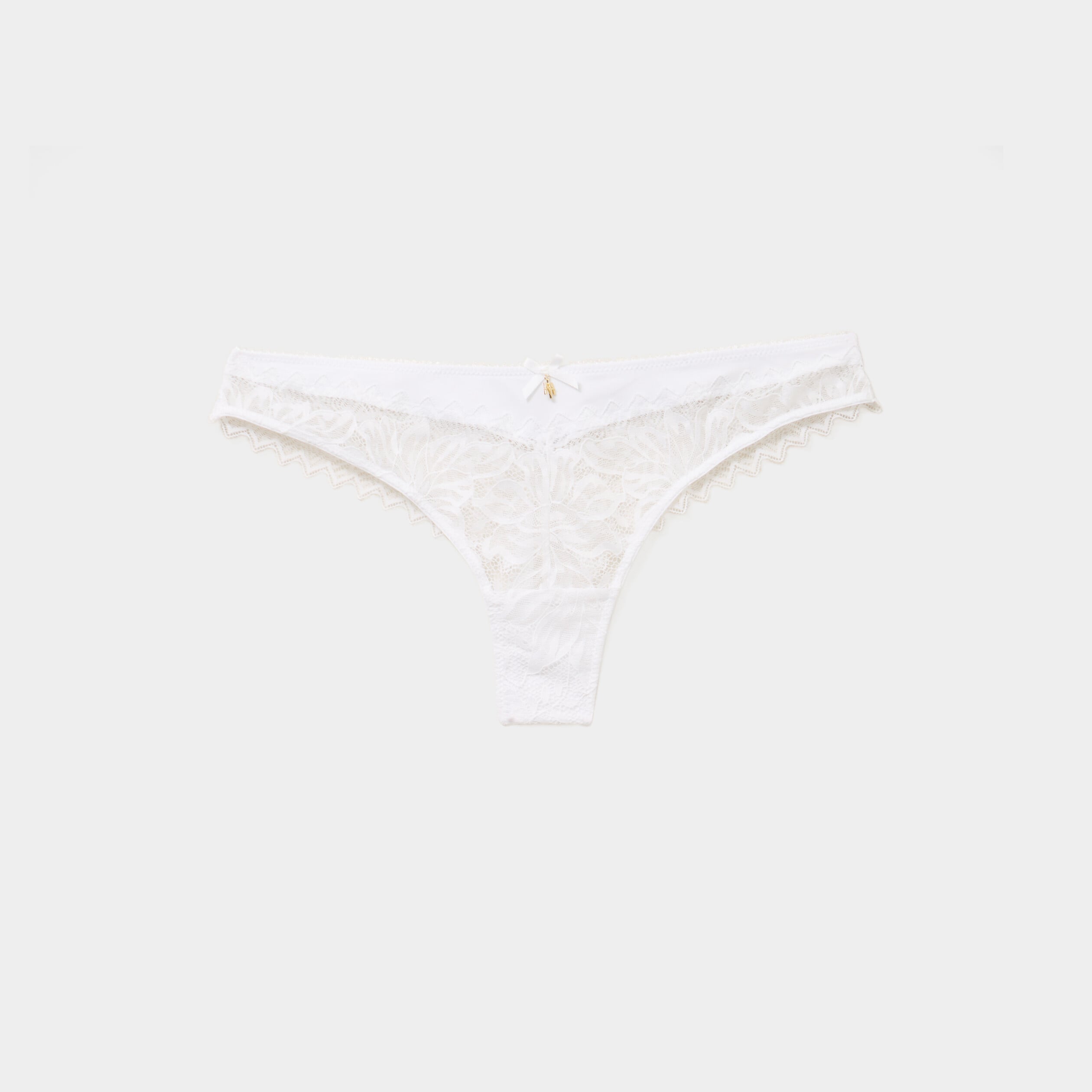 Tanga en dentelle avec noeud blanc femme