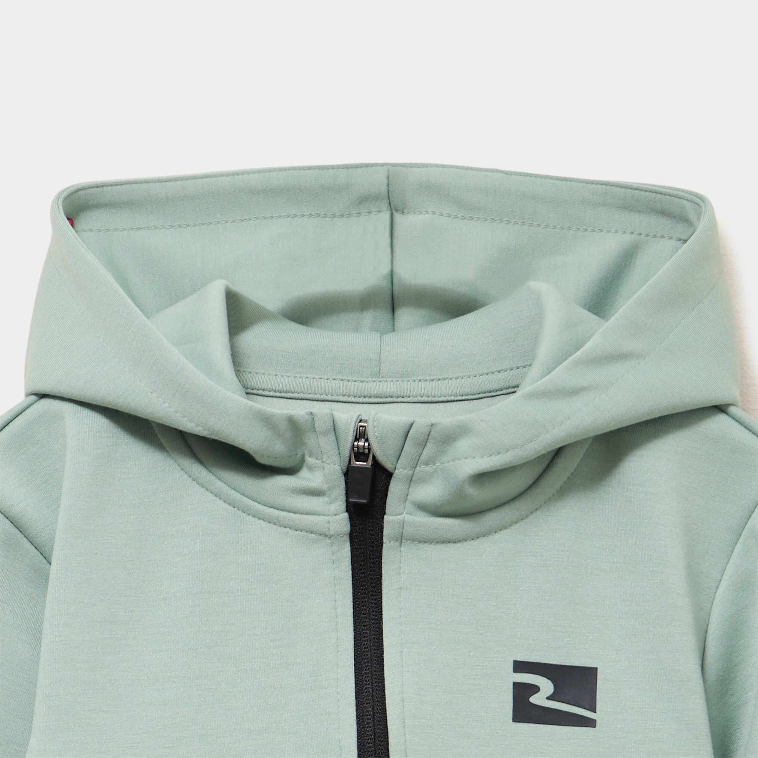 Sweat zipp&eacute; &agrave; capuche vert pastel gar&ccedil;on