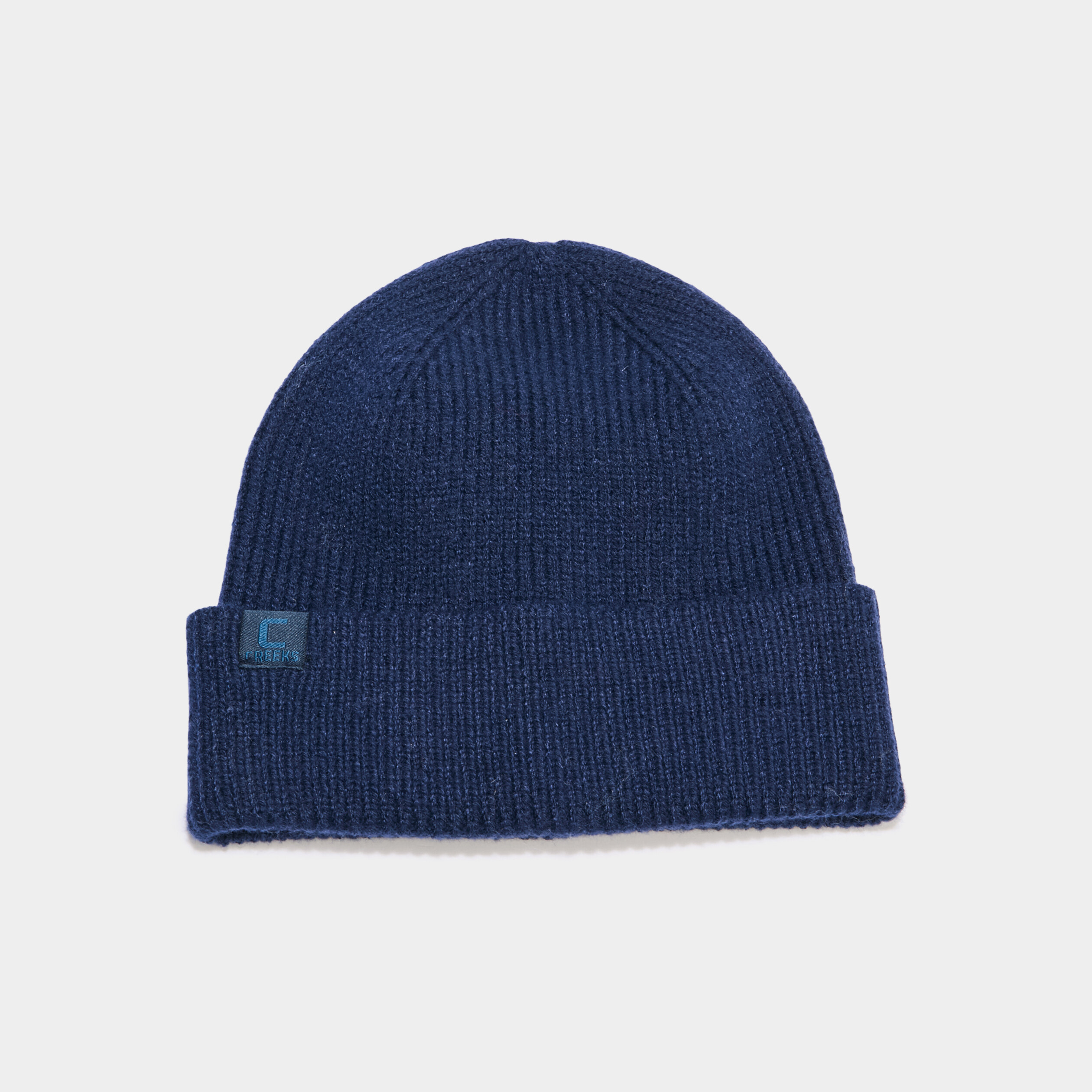 bonnet tricote creeks bleu marine homme Bonnet tricoté Creeks bleu marine homme