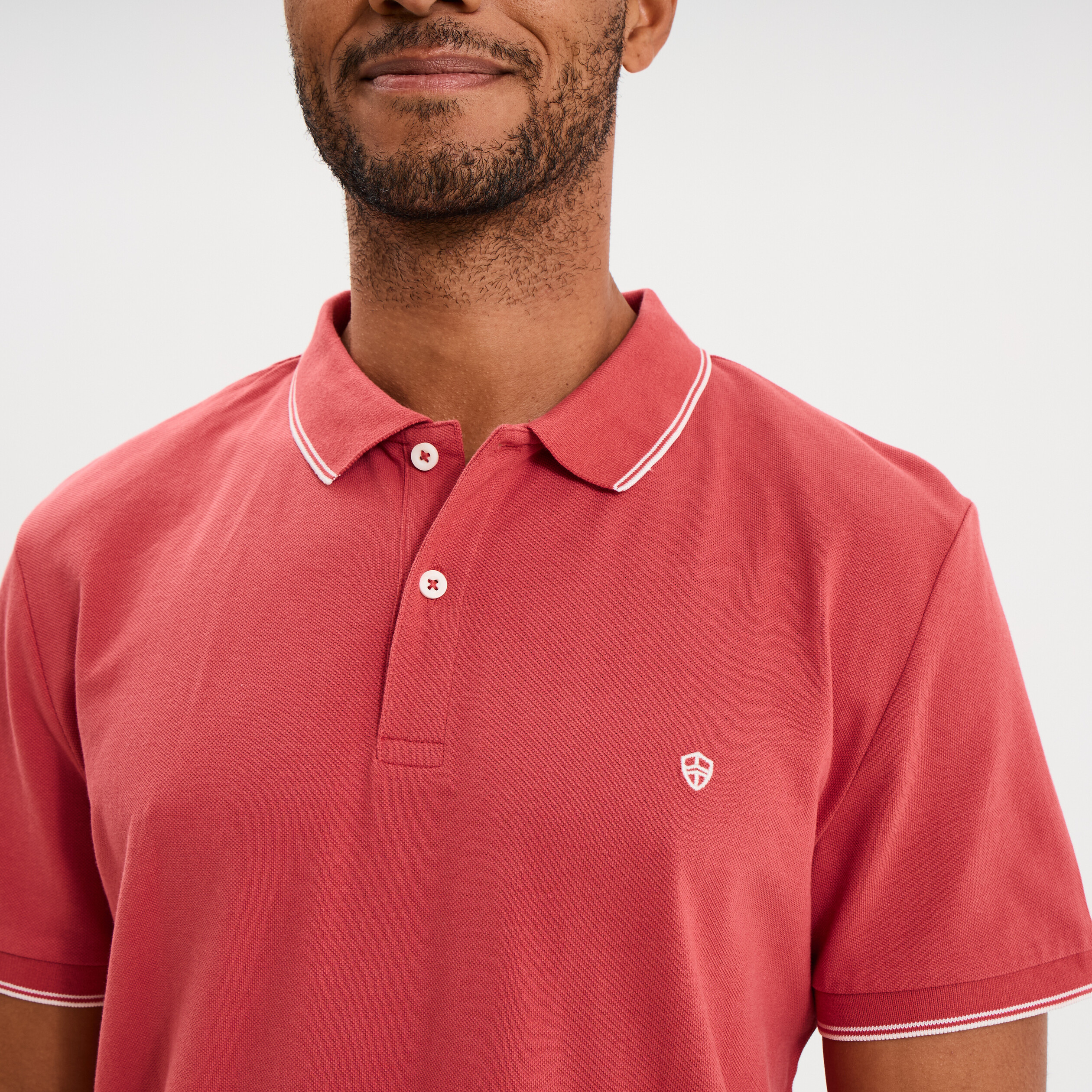 Polo piqu&eacute; coton manches courtes rose framboise homme