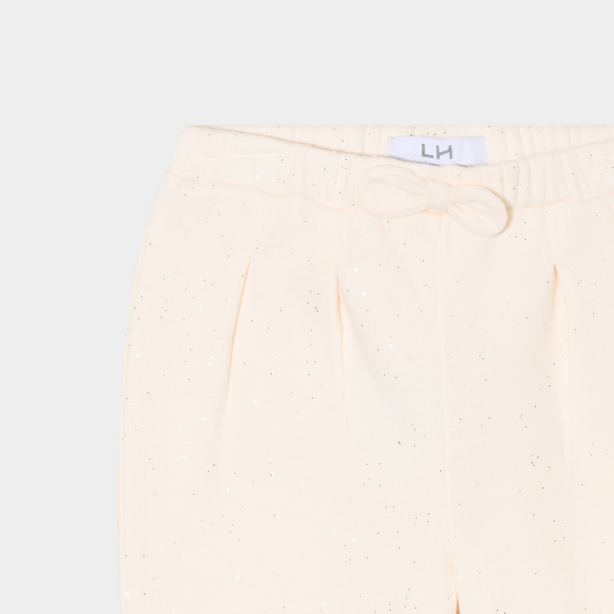 pantalon jogging paillettes et noeud creme bebef Pantalon jogging paillettes et noeud creme bébé fille