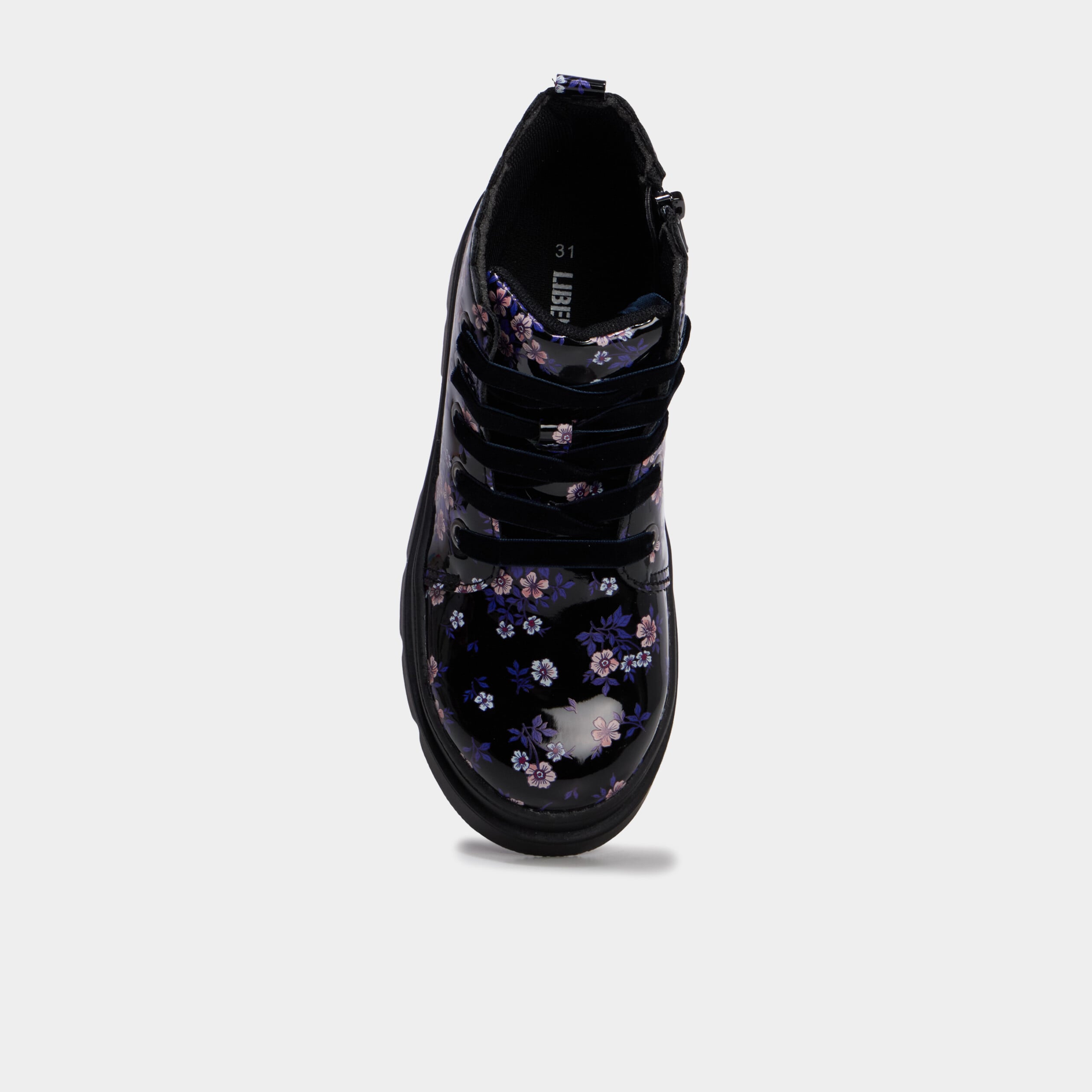 Boots crant&eacute;es vernies noir fille
