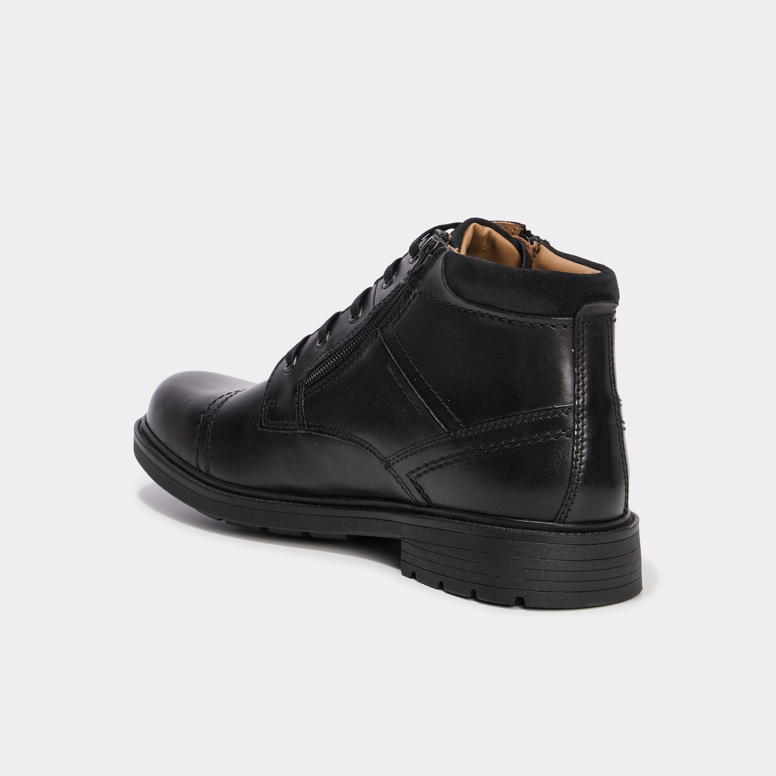 Bottines montantes zipp&eacute;es en cuir noir homme