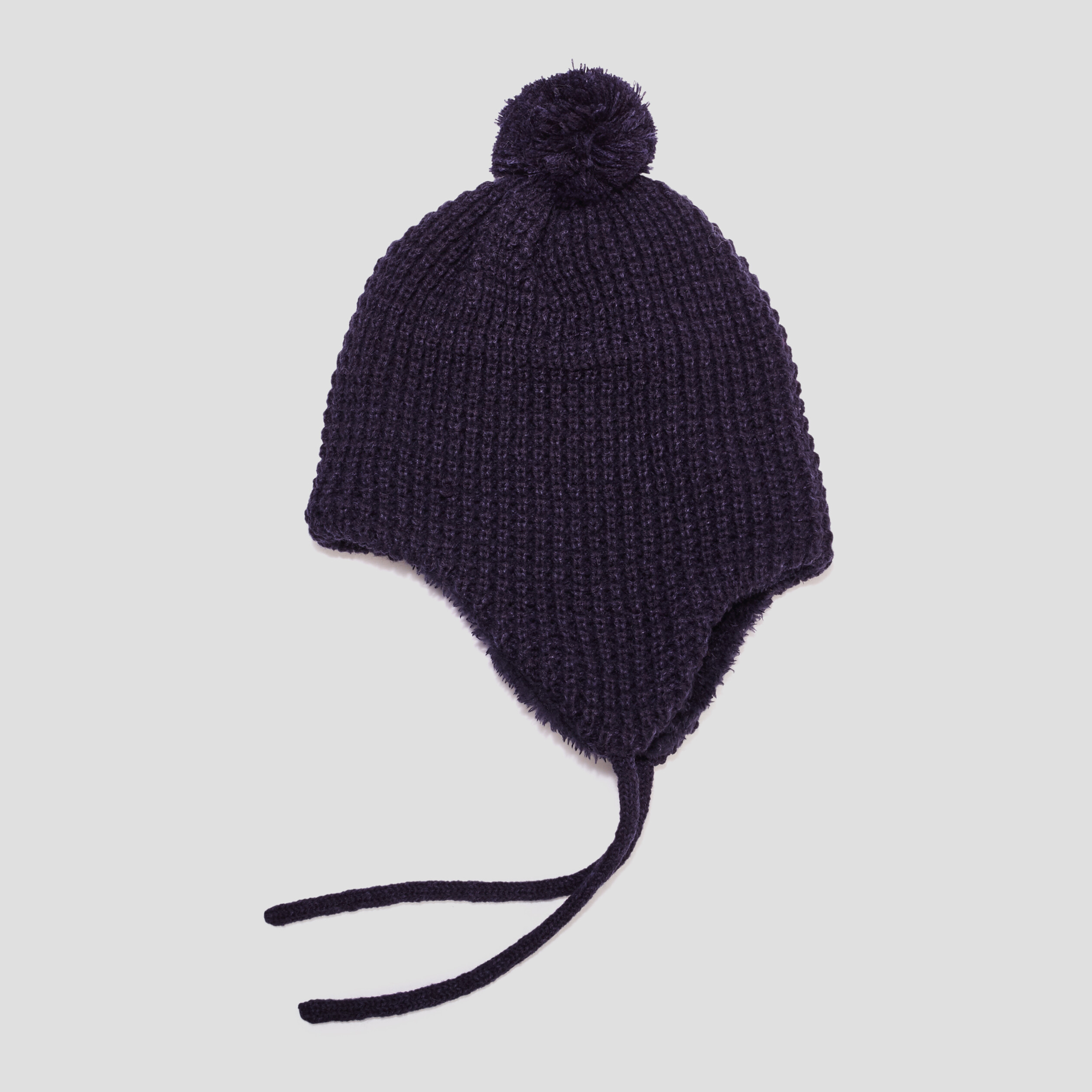 Ensemble bonnet et moufles tricotés bleu marine bébé