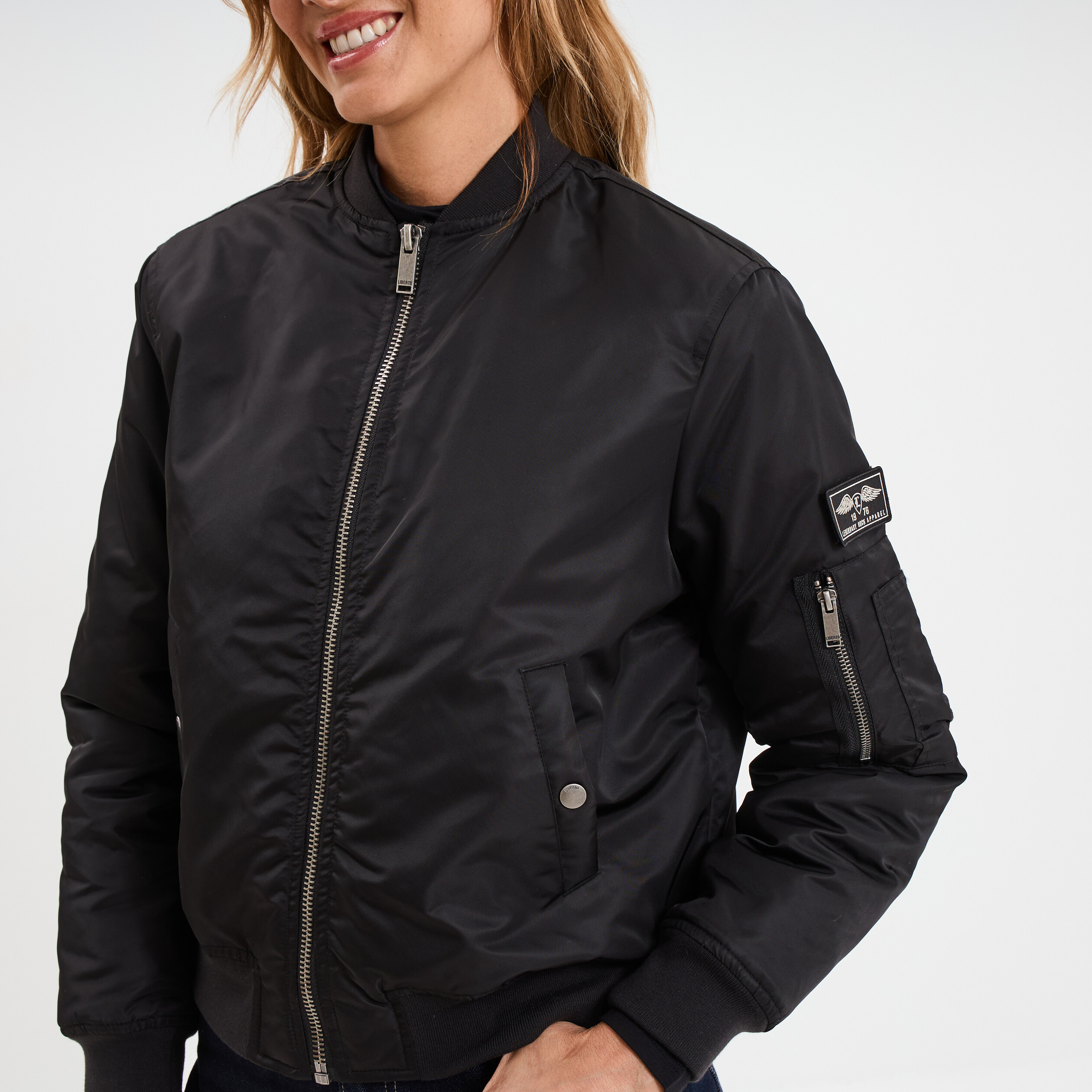 Blouson d&eacute;perlant col teddy noir femme