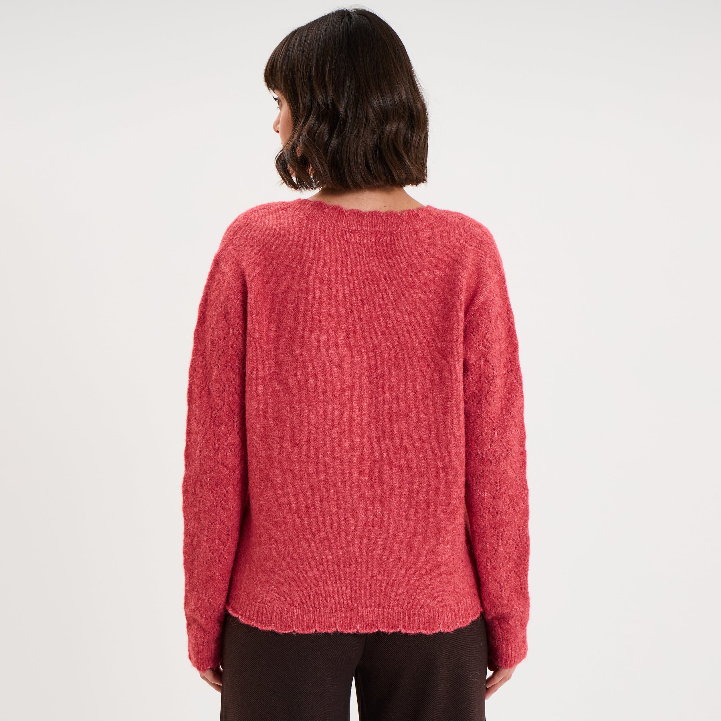 Pull col V ajour&eacute; manches longues rose cerise femme