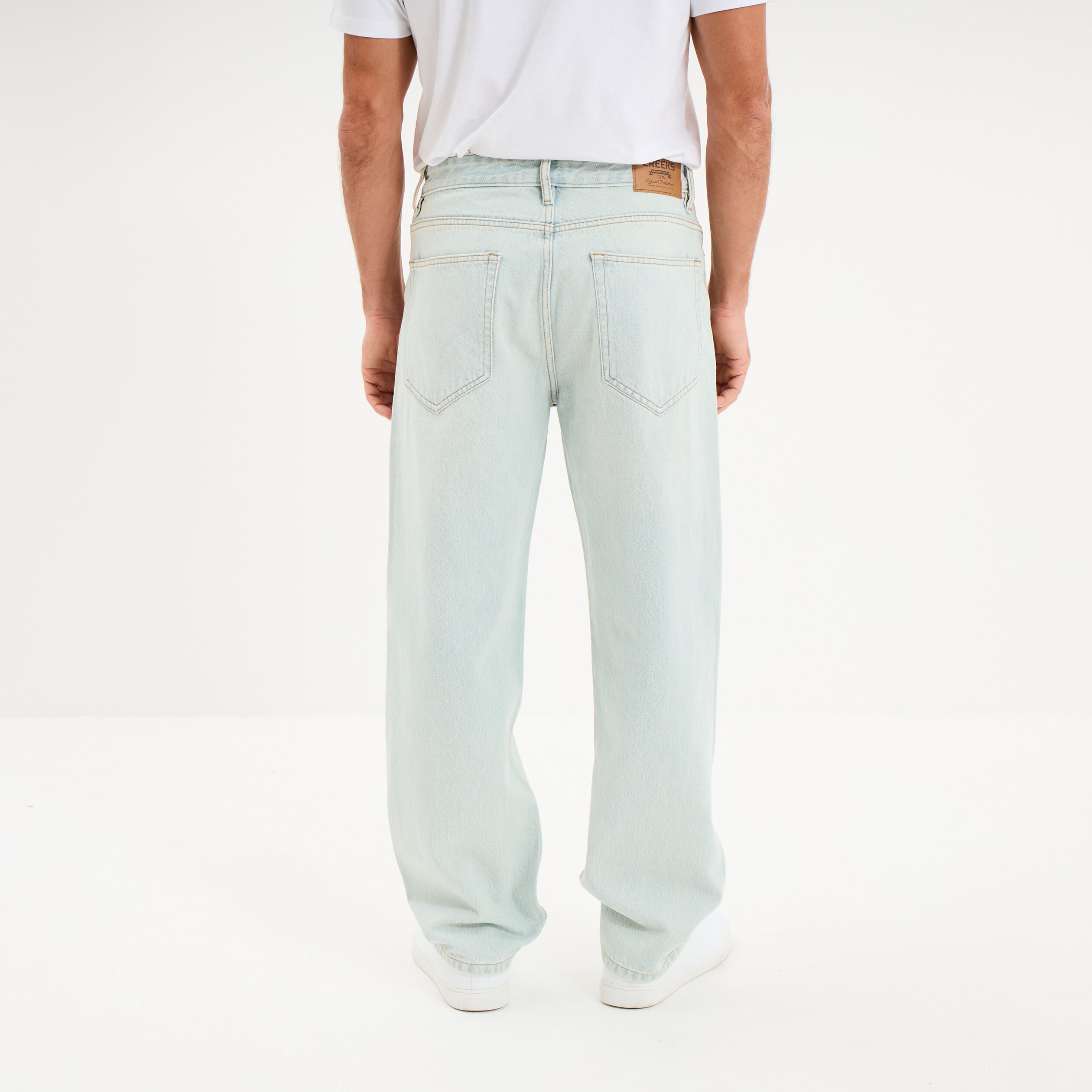 Jean relaxed 5 poches coton denim bleach homme