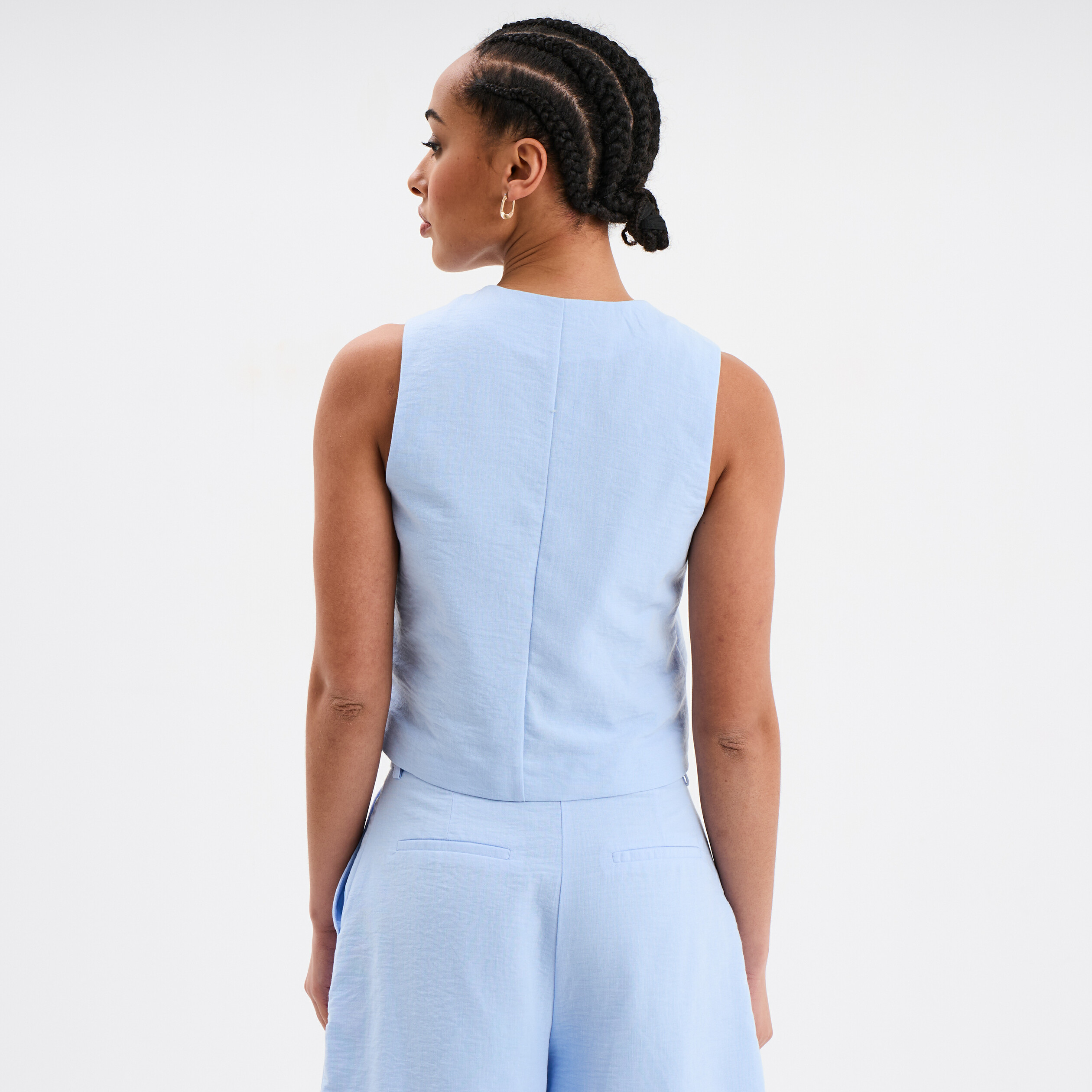 veston sans manches bleu ciel femme Veston sans manches bleu ciel femme