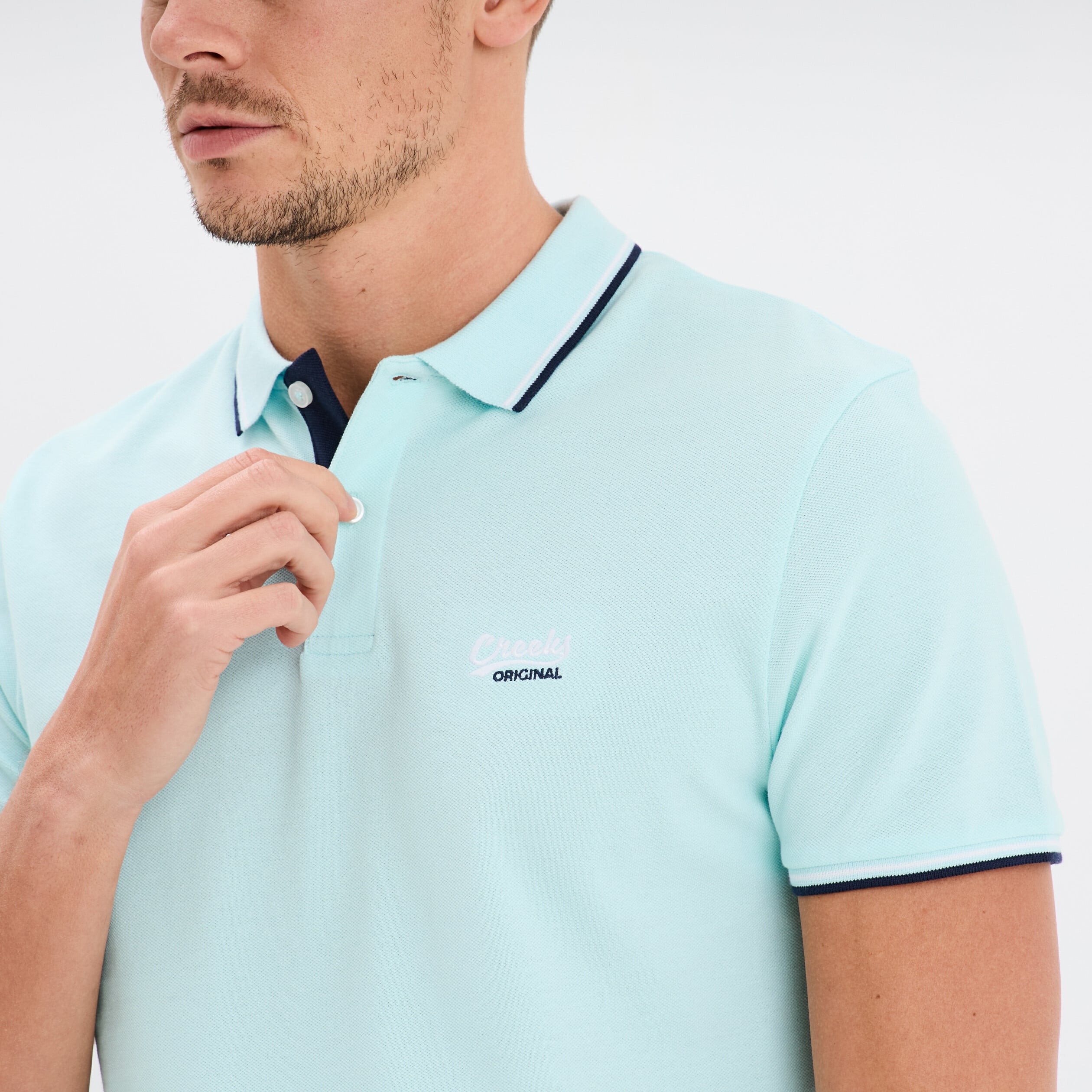 Polo avec broderie poitrine coton Creeks bleu turquoise homme
