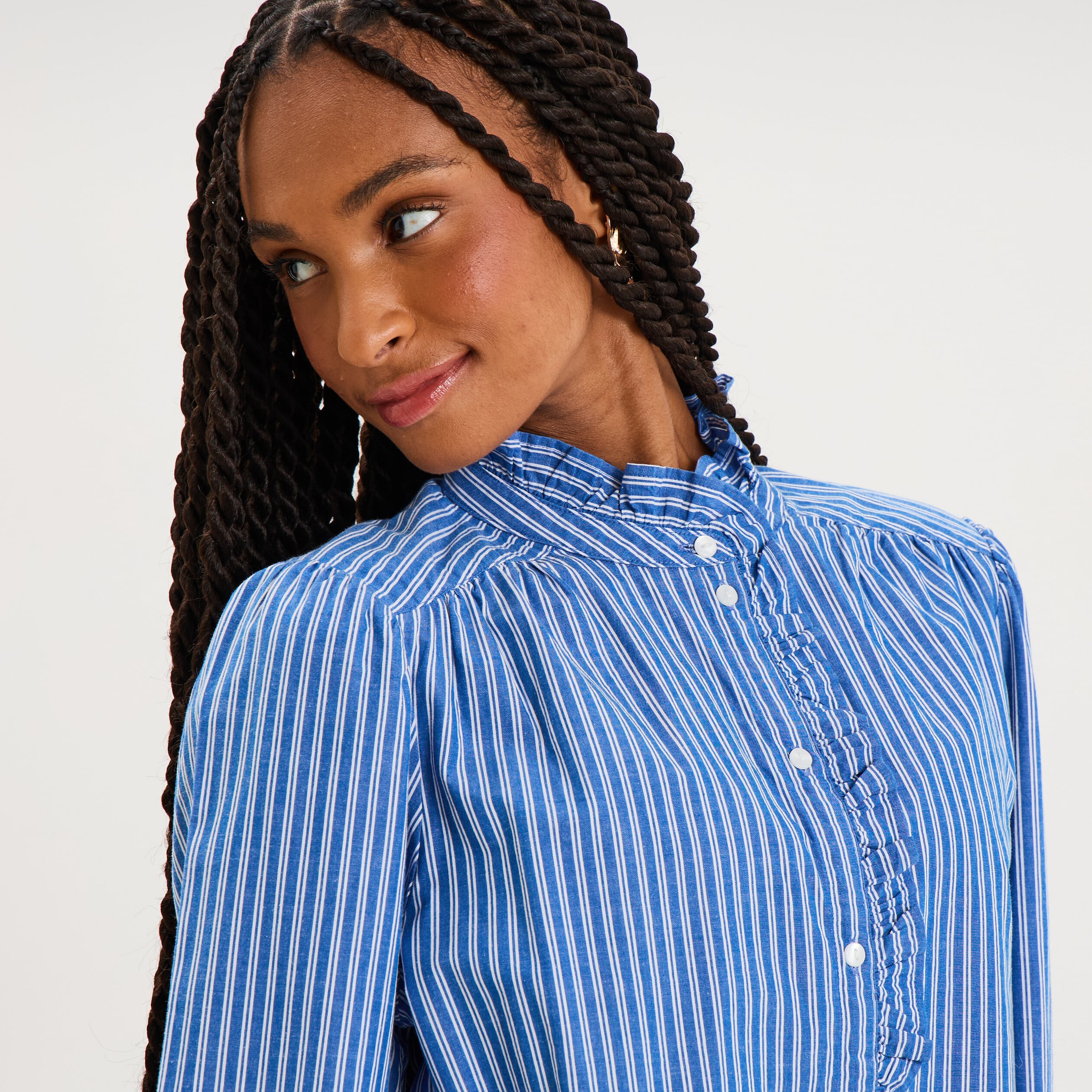 Blouse manches longues col montant bleu femme