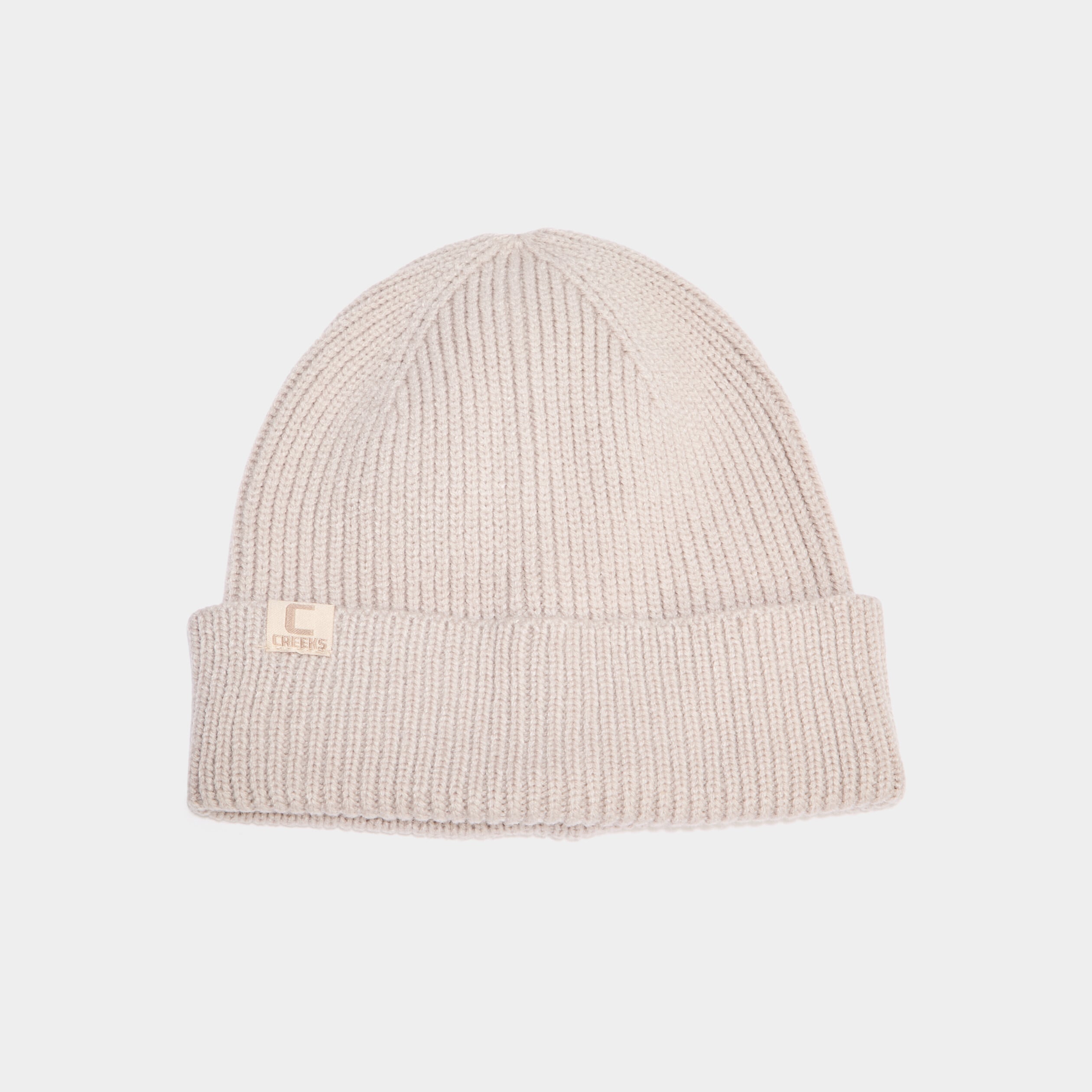 Bonnet tricot&eacute; avec bord &agrave; revers sable femme