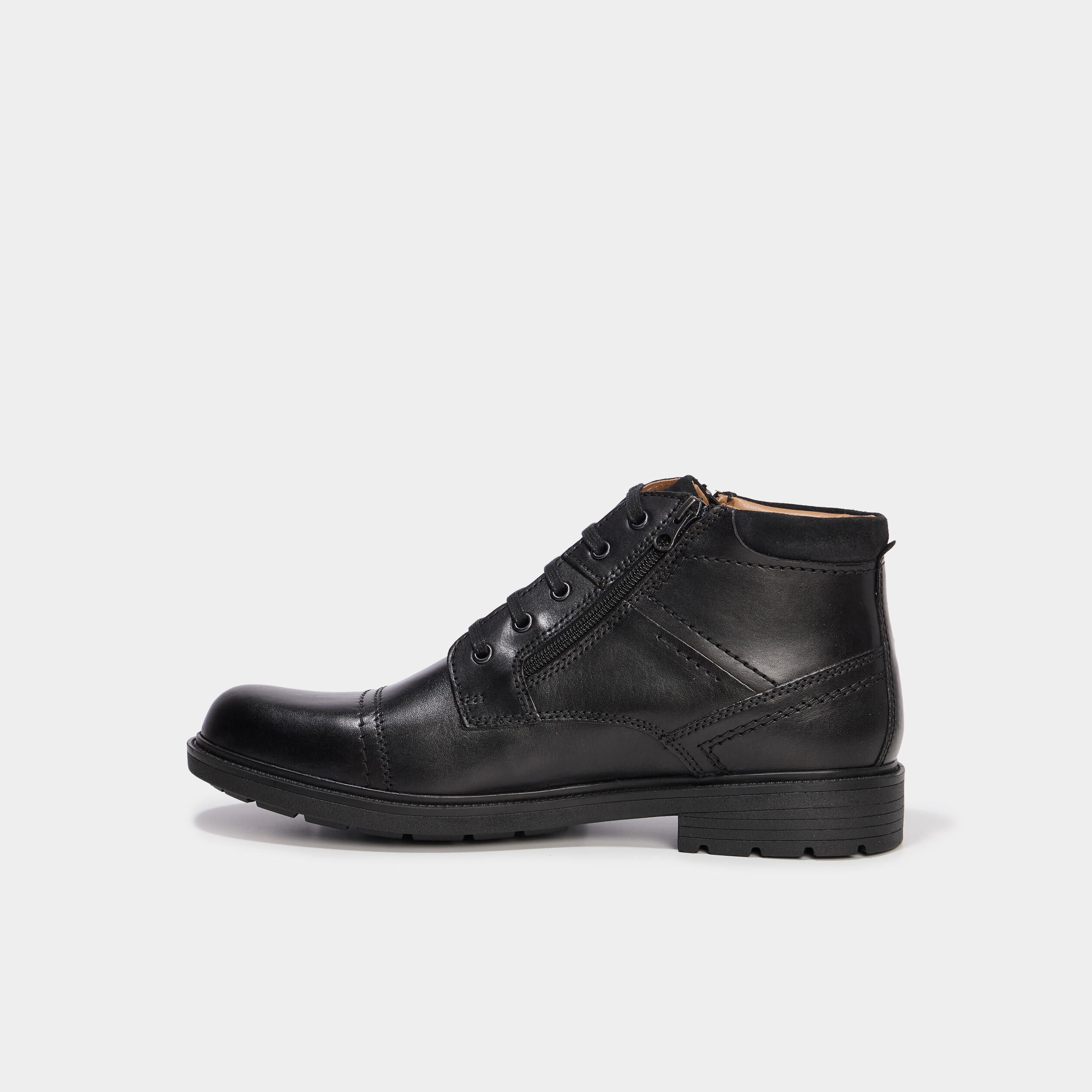 Bottines montantes zipp&eacute;es en cuir noir homme