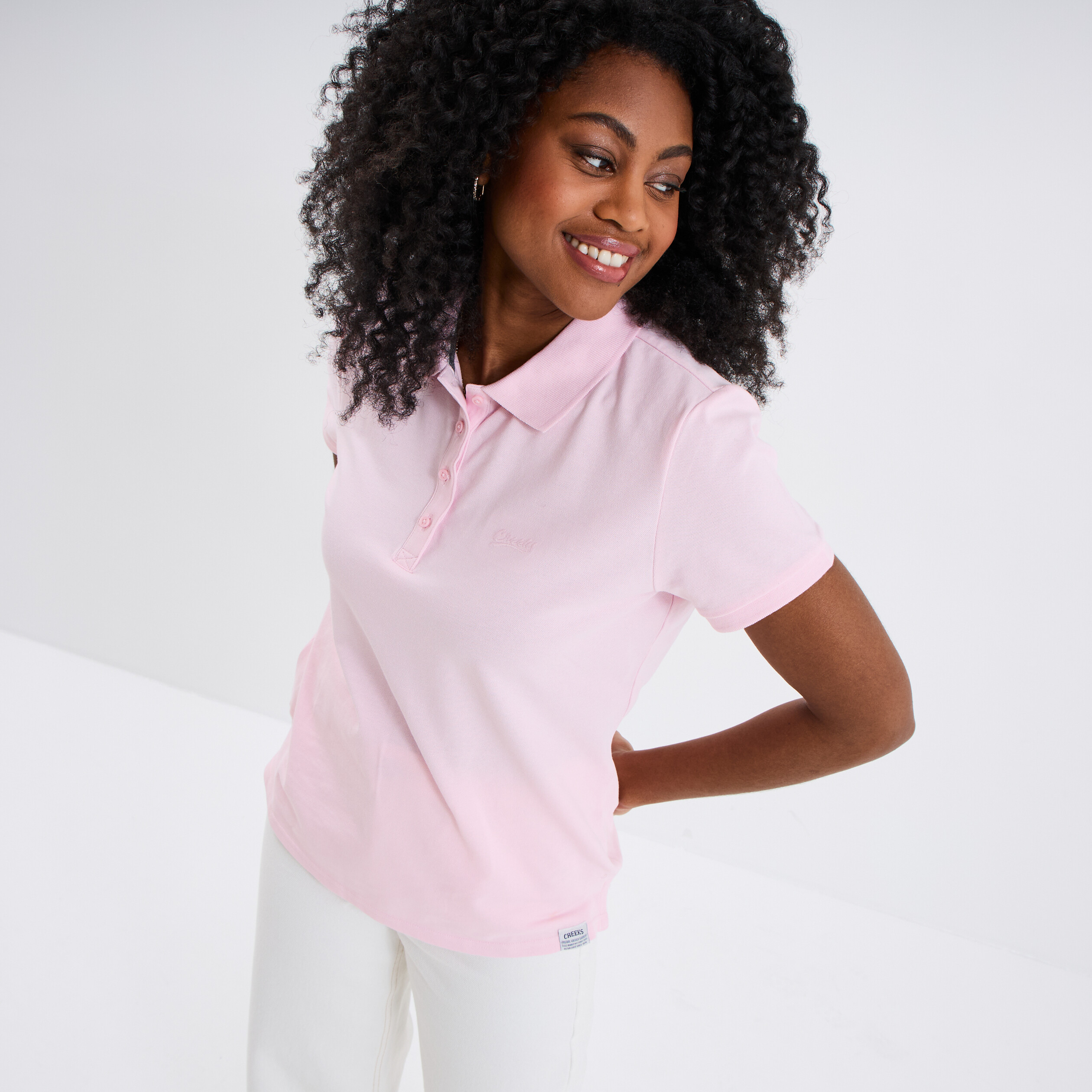 Polo piqu&eacute; ajust&eacute; manches courtes coton rose femme