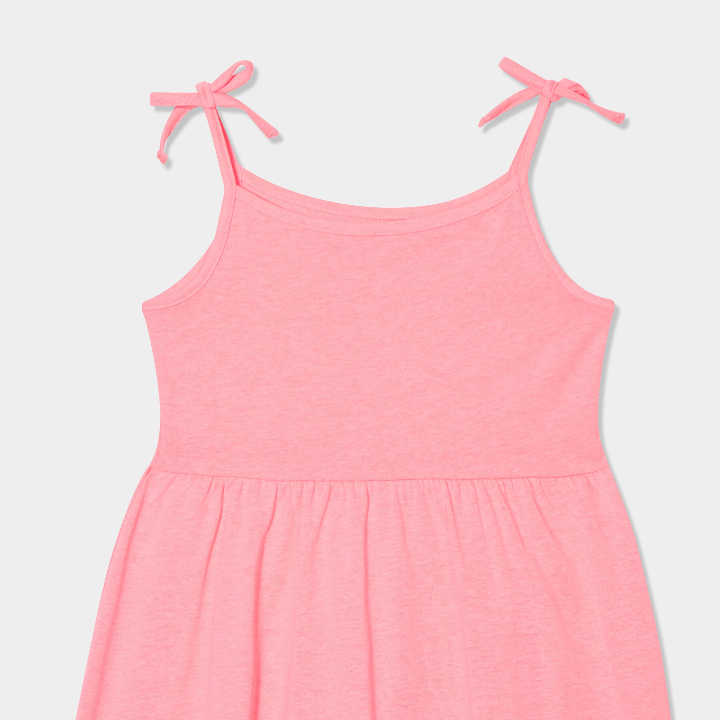 Robe courte bretelles nou&eacute;es &eacute;vas&eacute;e rose fluo fille