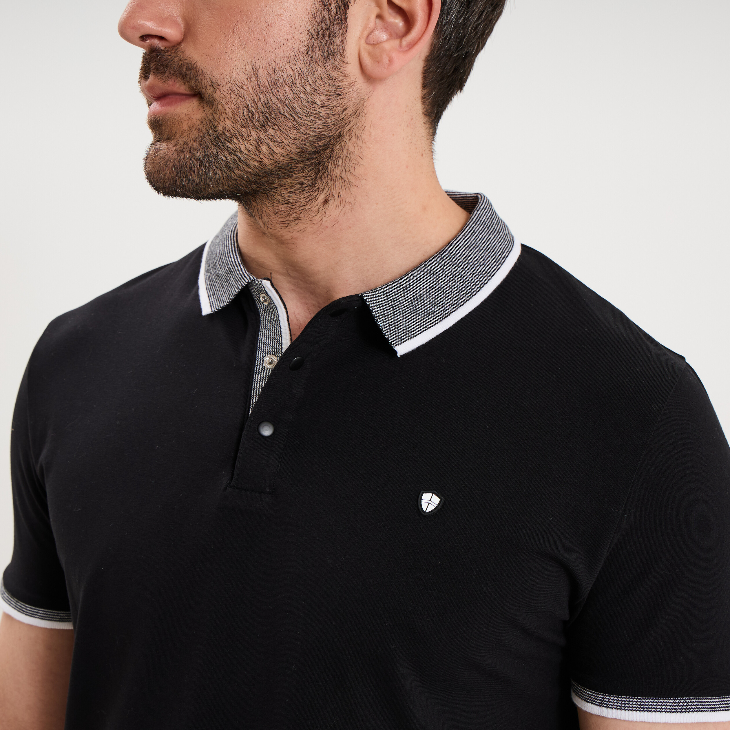 Polo slim manches courtes stretch noir homme