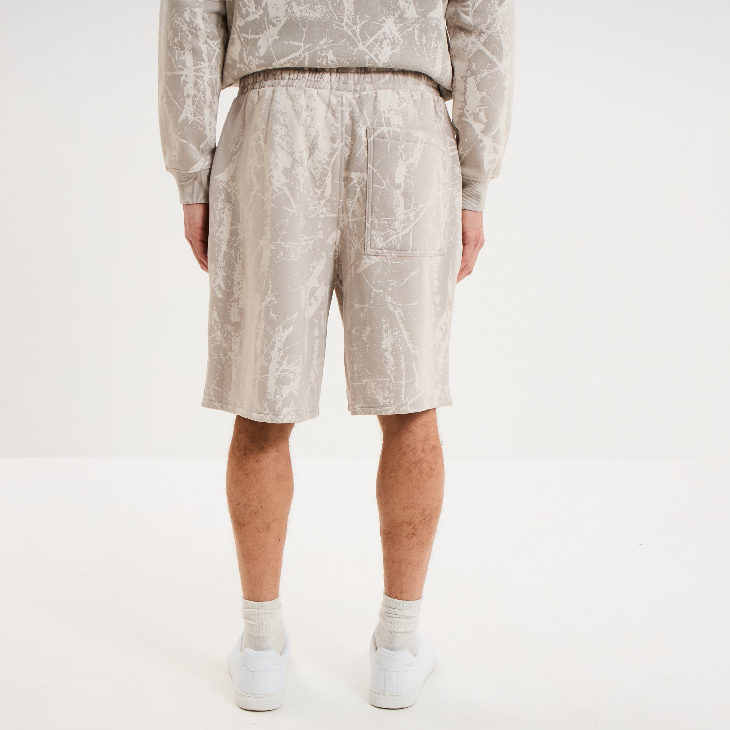 Short de jogging long coupe large gris clair homme