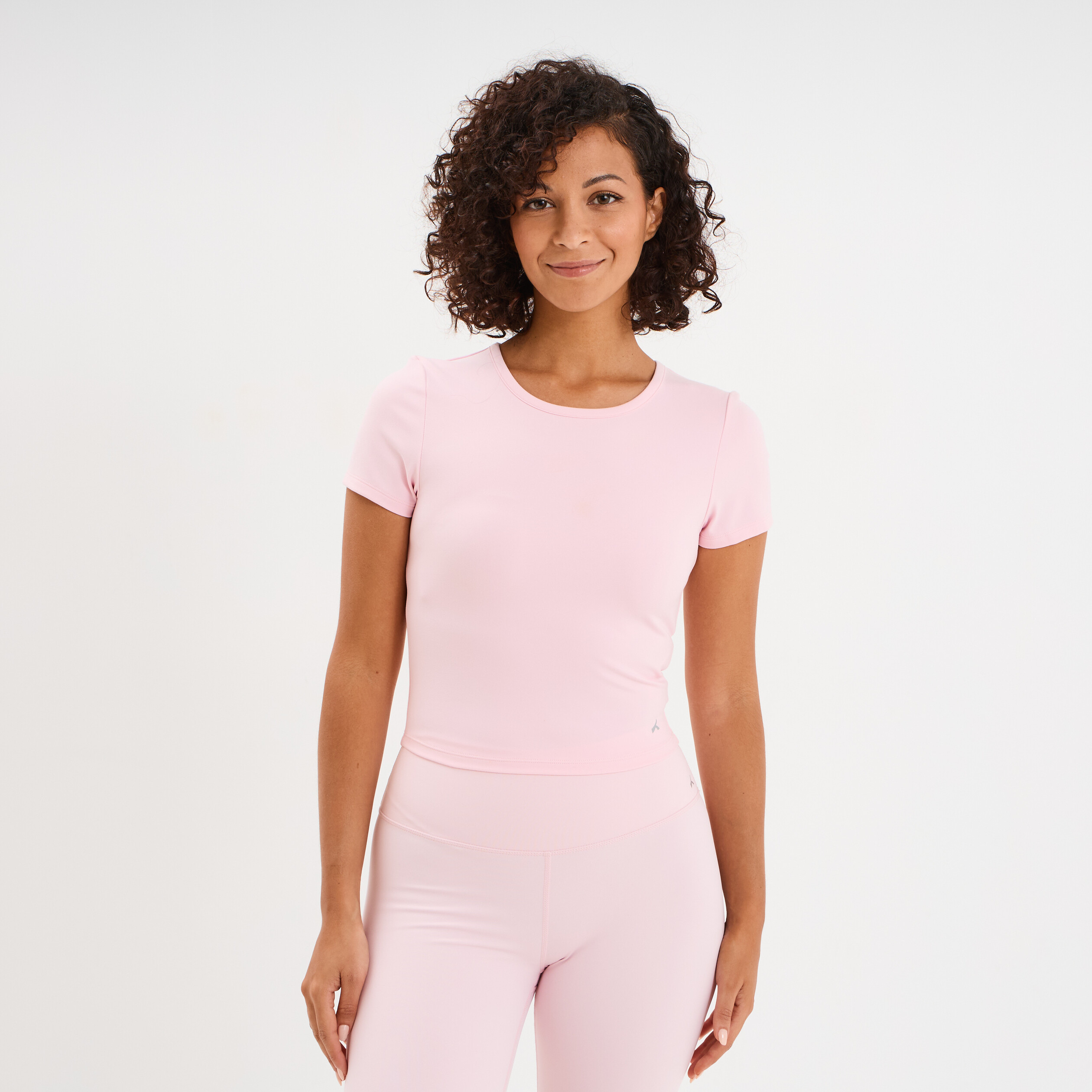 T-shirt de sport court ajust&eacute; rose clair femme