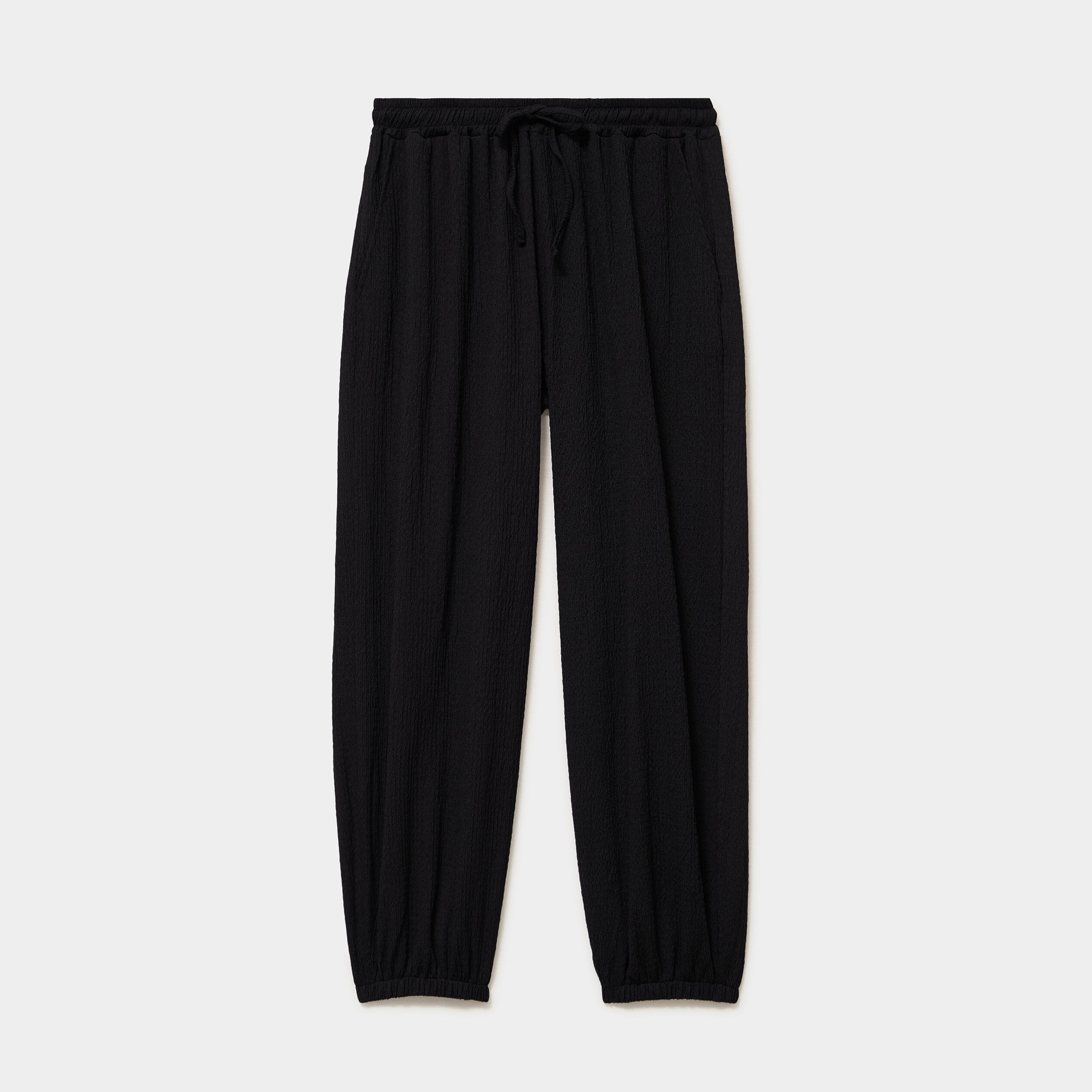 Pantalon fluide gaufr&eacute; noir femme