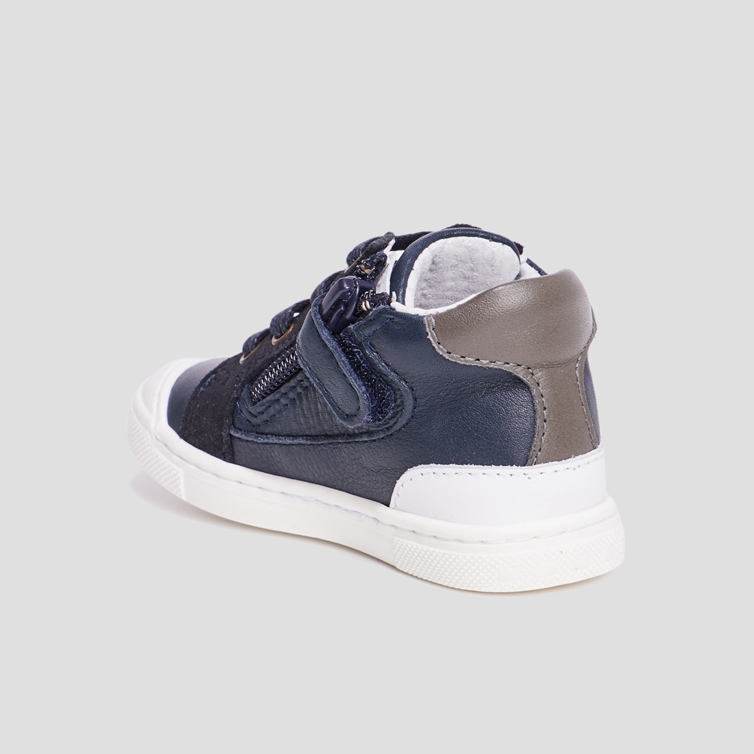 Bottillons zipp&eacute;s en cuir bleu marine b&eacute;b&eacute; gar&ccedil;on