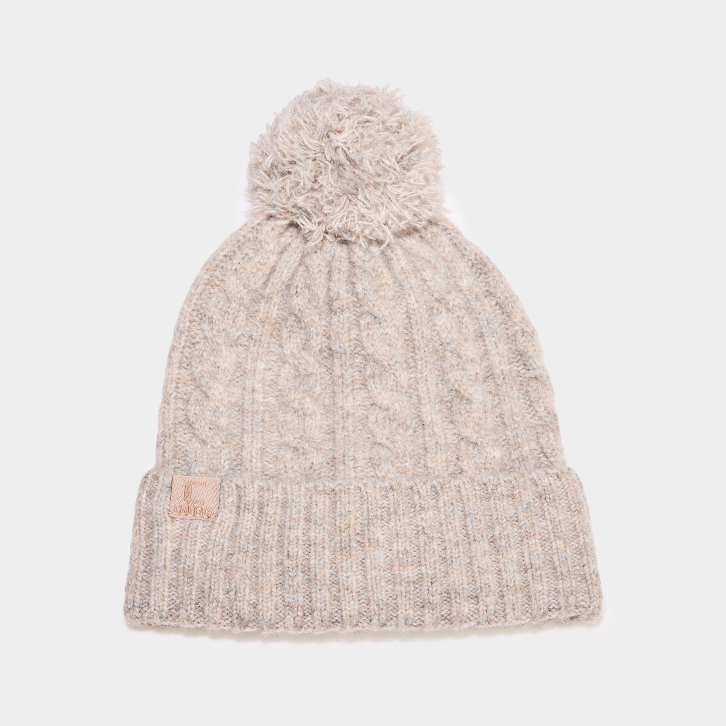 Bonnet &agrave; pompon et torsades beige mixte