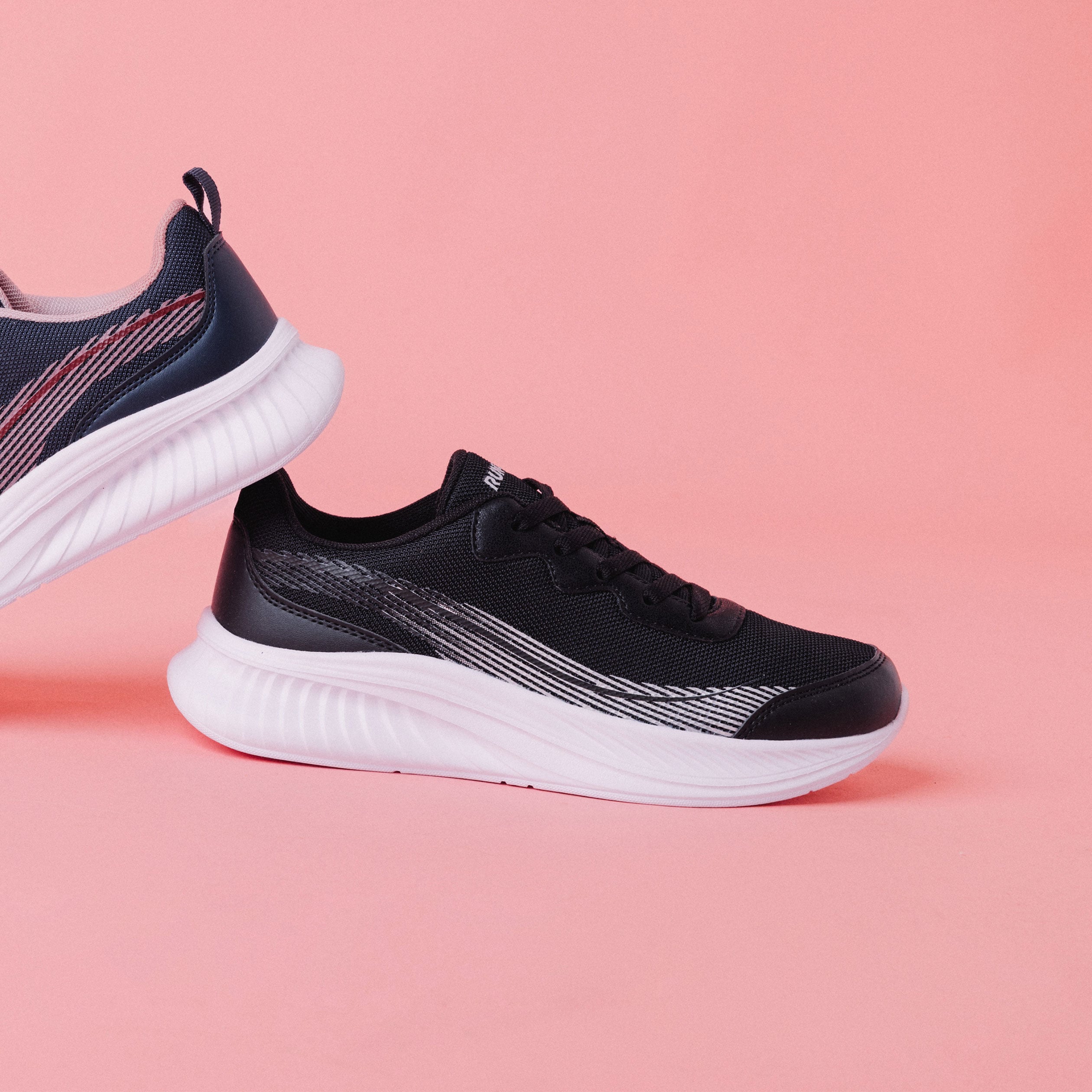 Baskets running noir femme