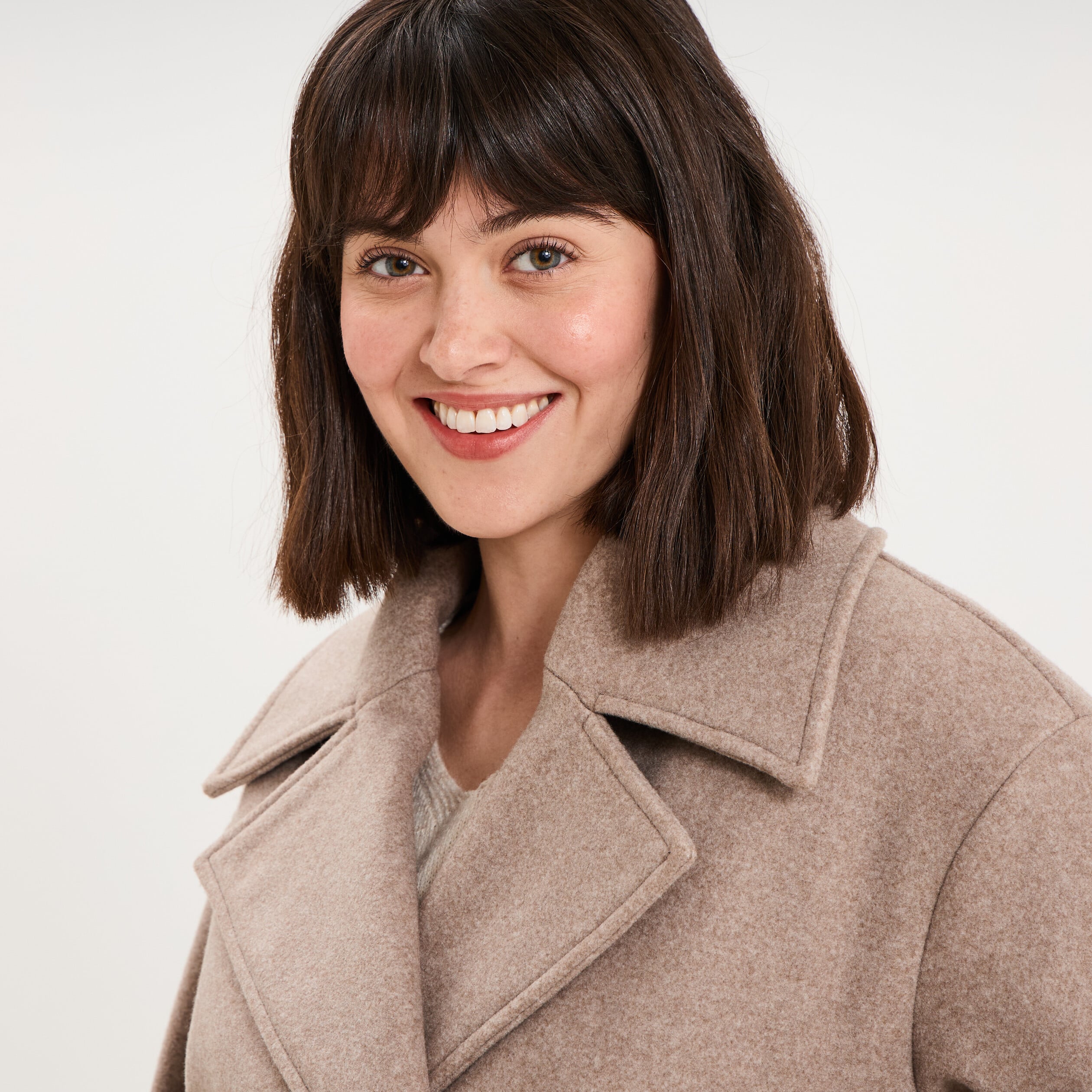 Manteau court double boutonnage beige femme