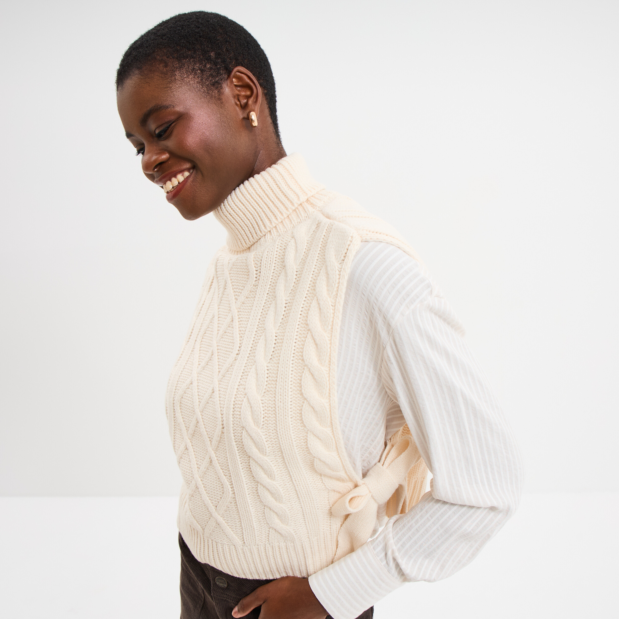 Pull gilet noeuds col roulé sans manches sable femme