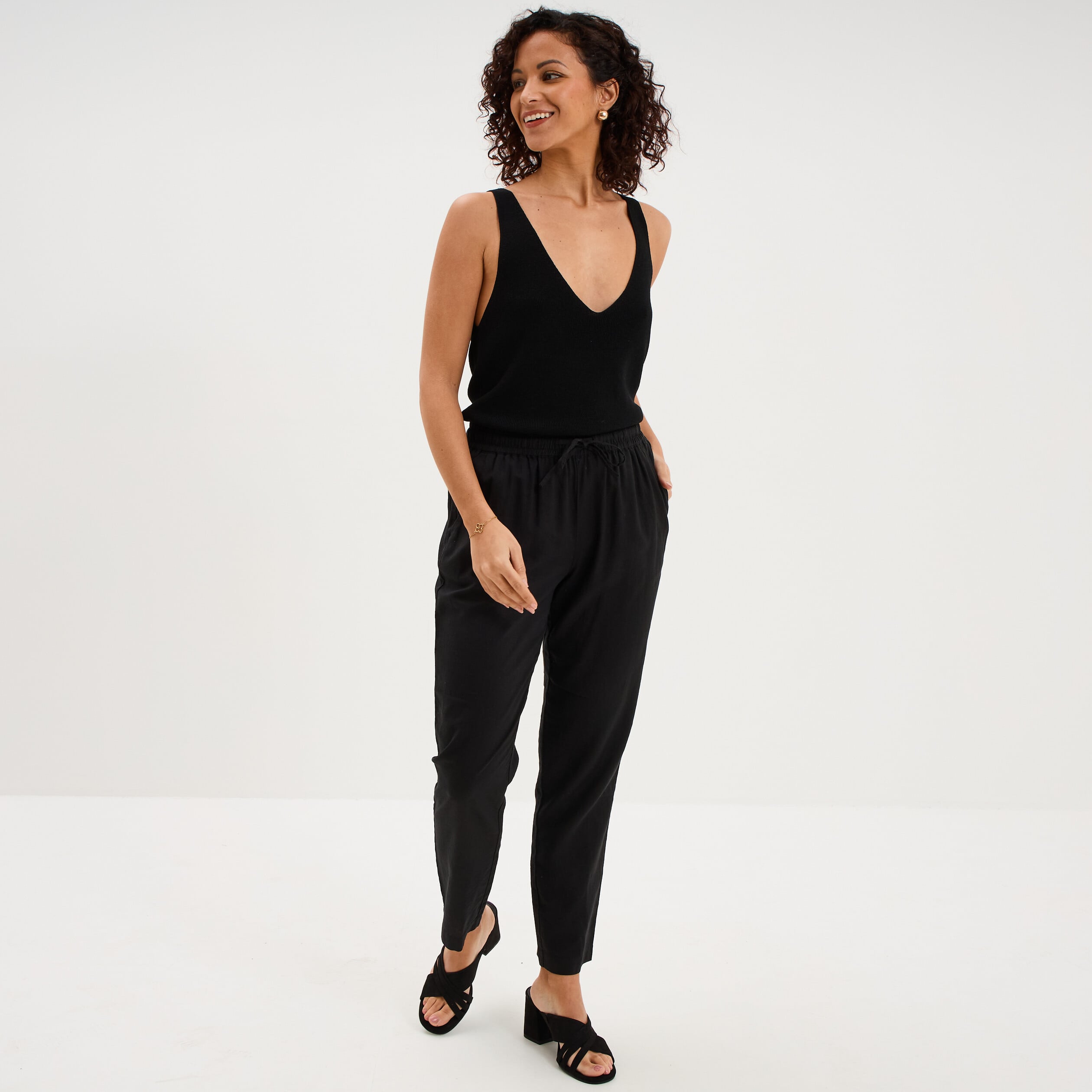 D&eacute;bardeur en maille col en V noir femme