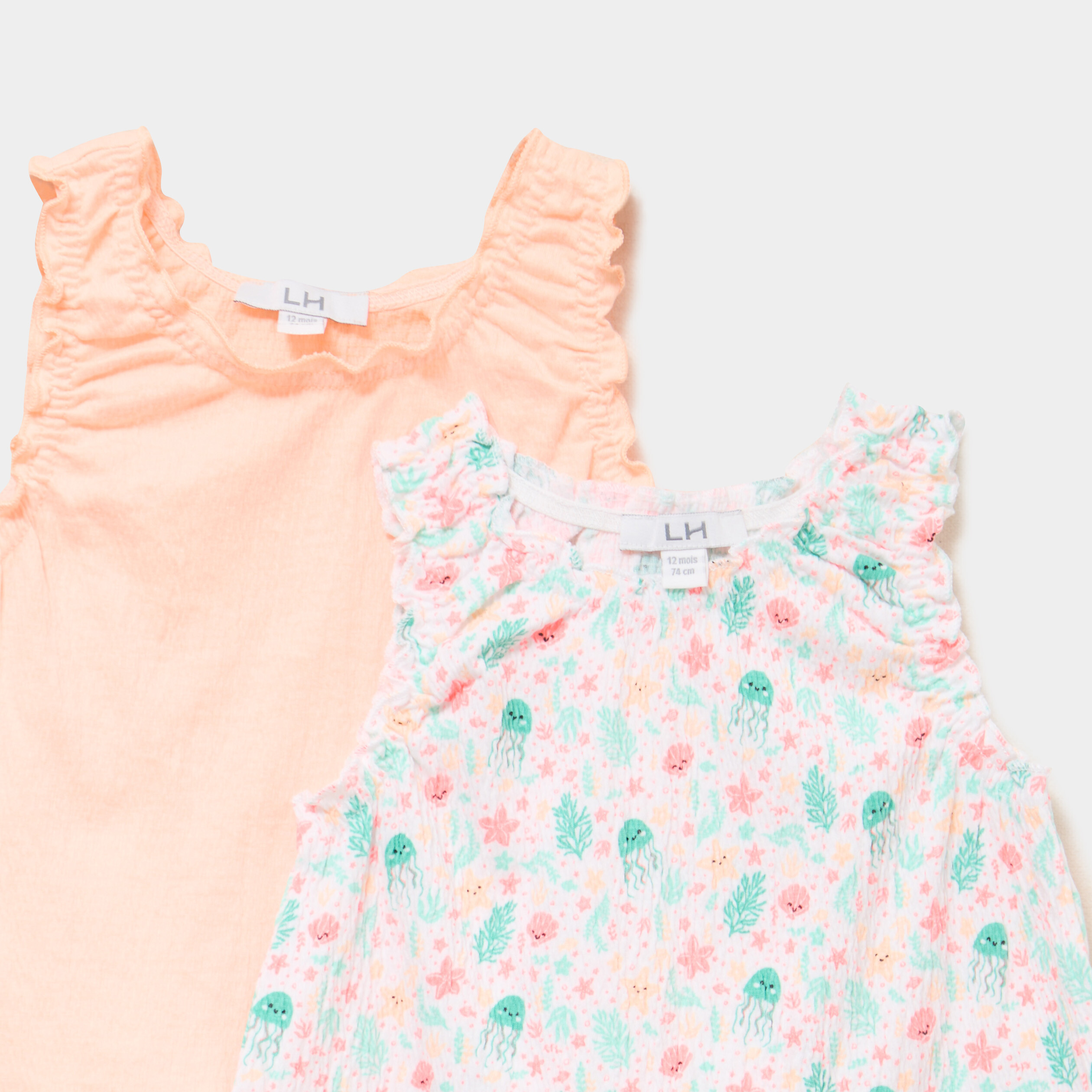 Lot 2 d&eacute;bardeurs droits cols ronds blanc b&eacute;b&eacute; fille