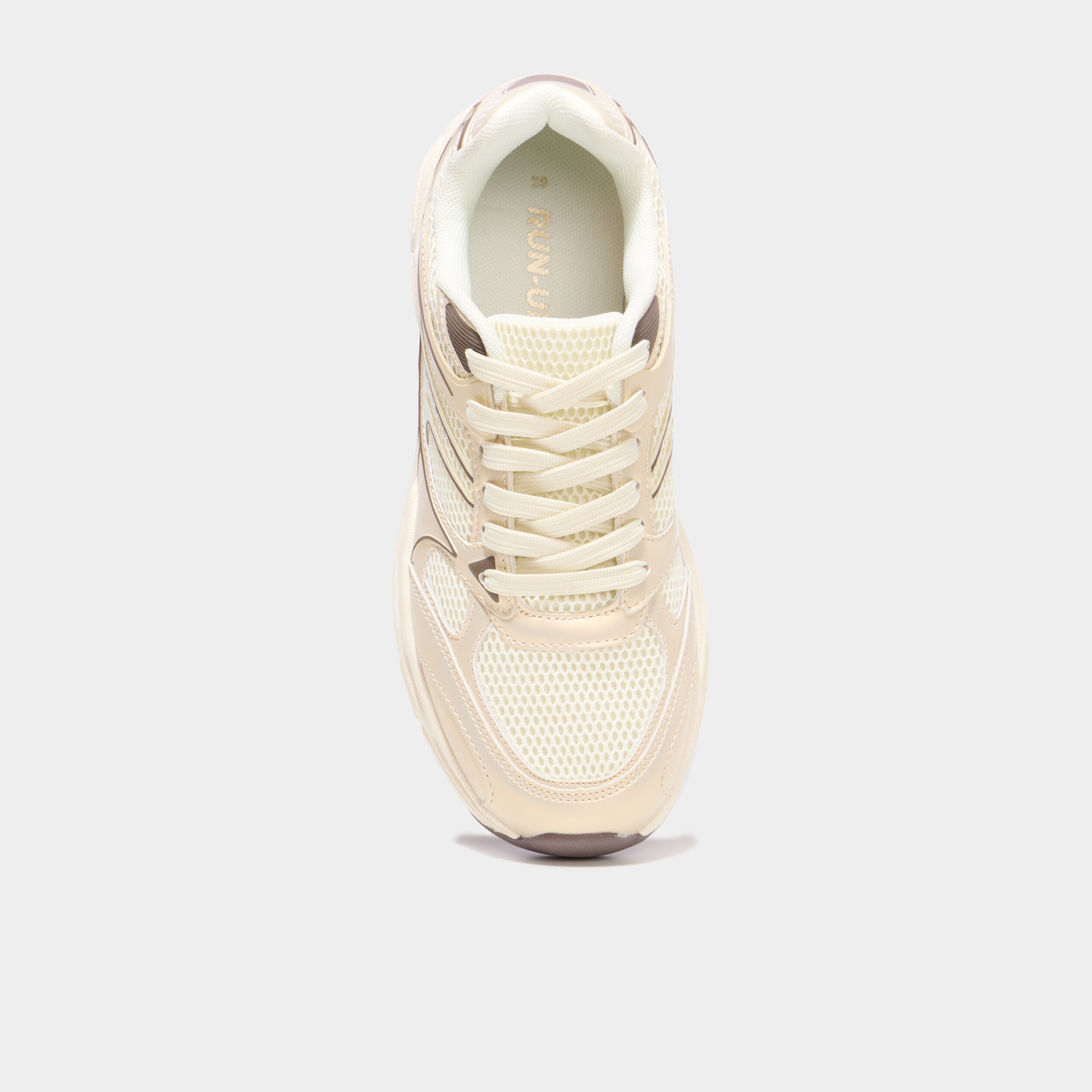 Baskets running sable femme