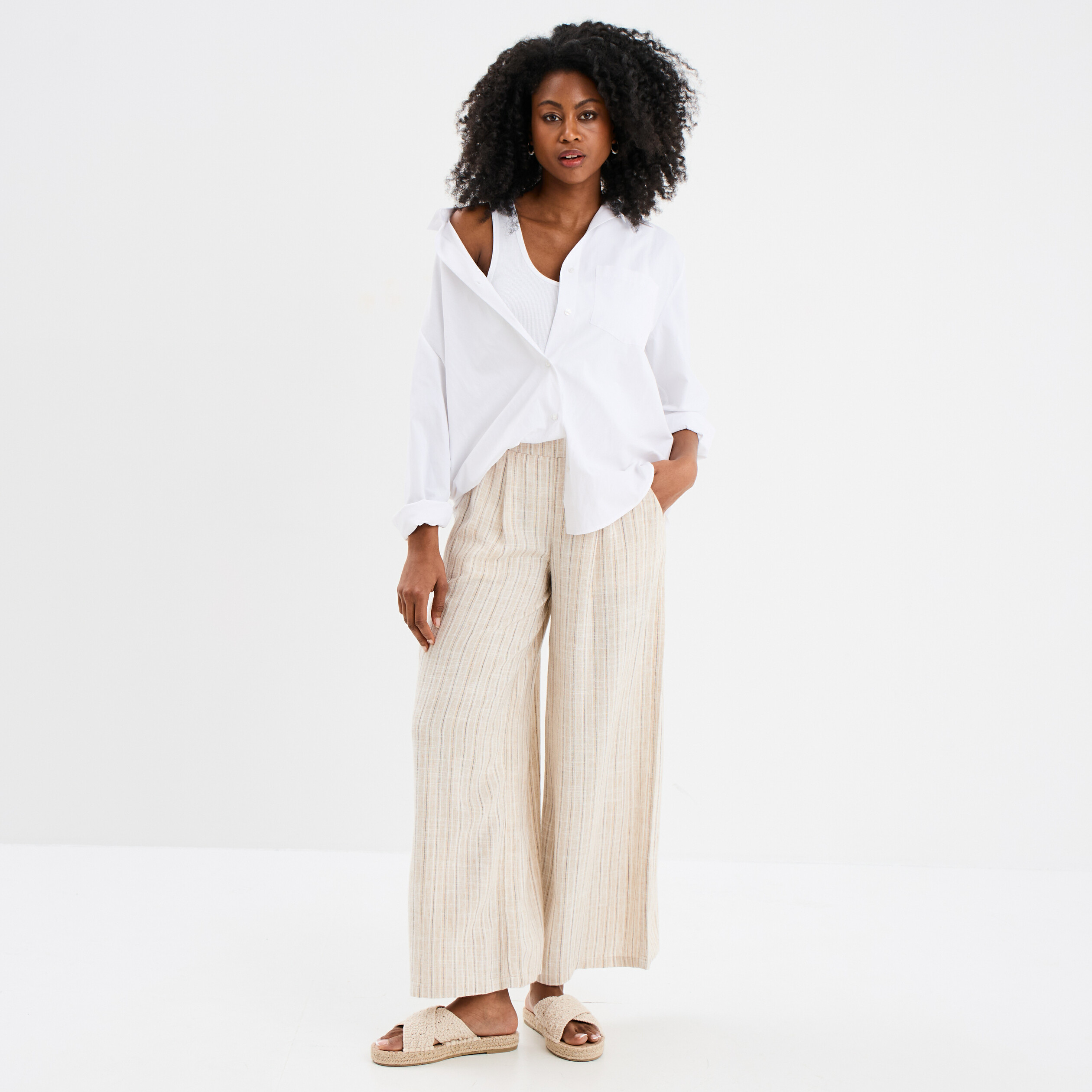 pantalon large elastique en lin melange beige femme Pantalon large élastiqué en lin mélangé beige femme