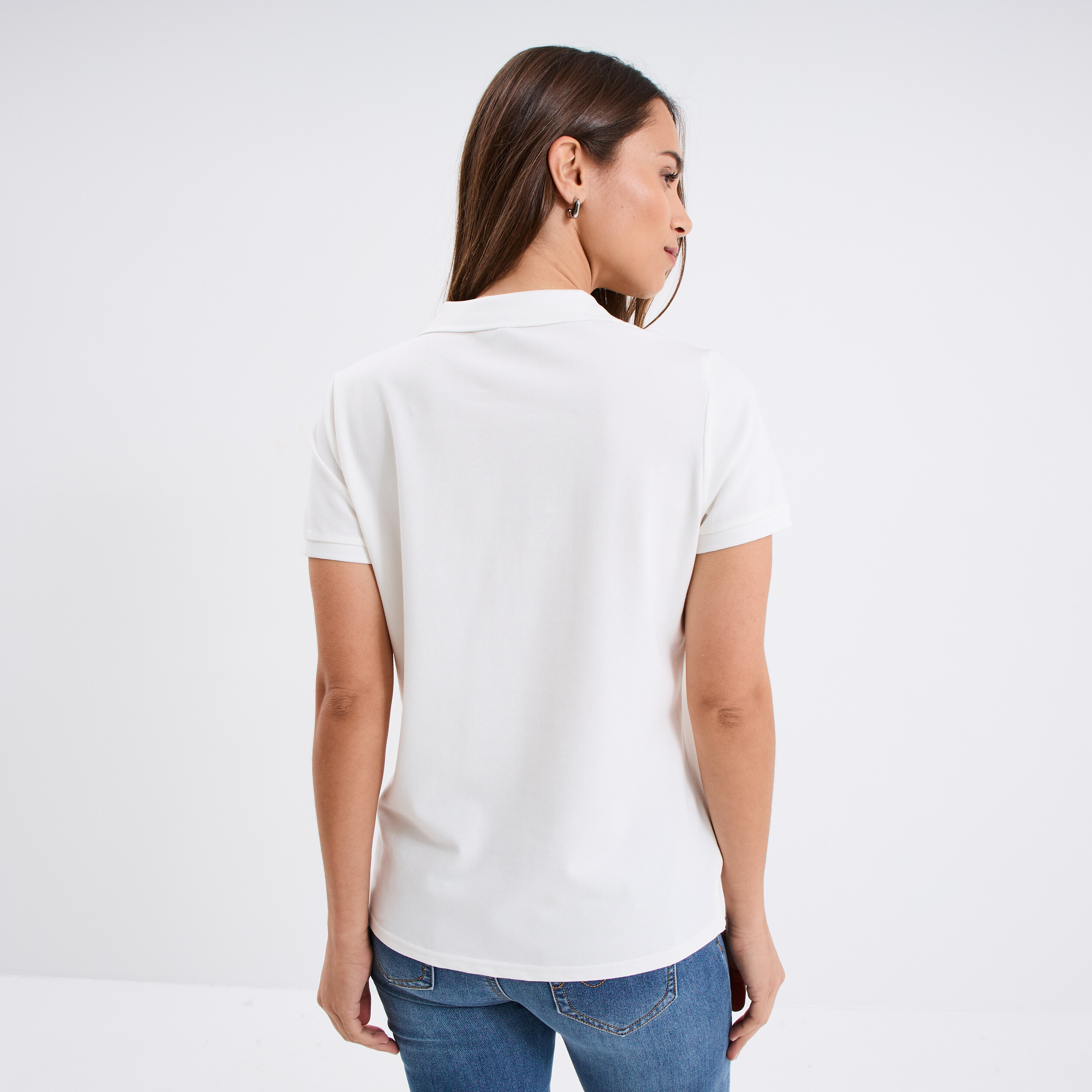 Polo piqu&eacute; ajust&eacute; manches courtes coton blanc femme