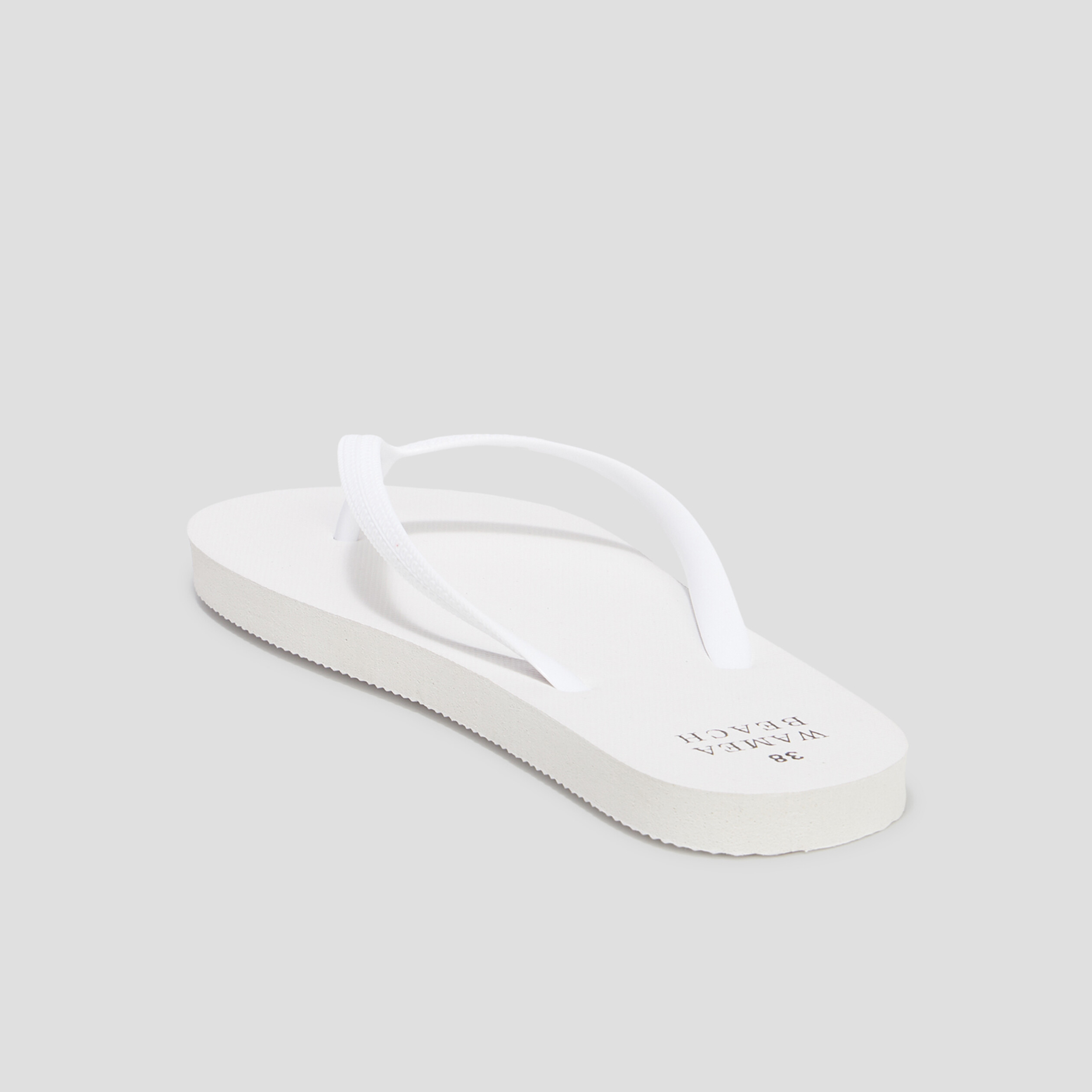 Tongs semelle plate blanc femme