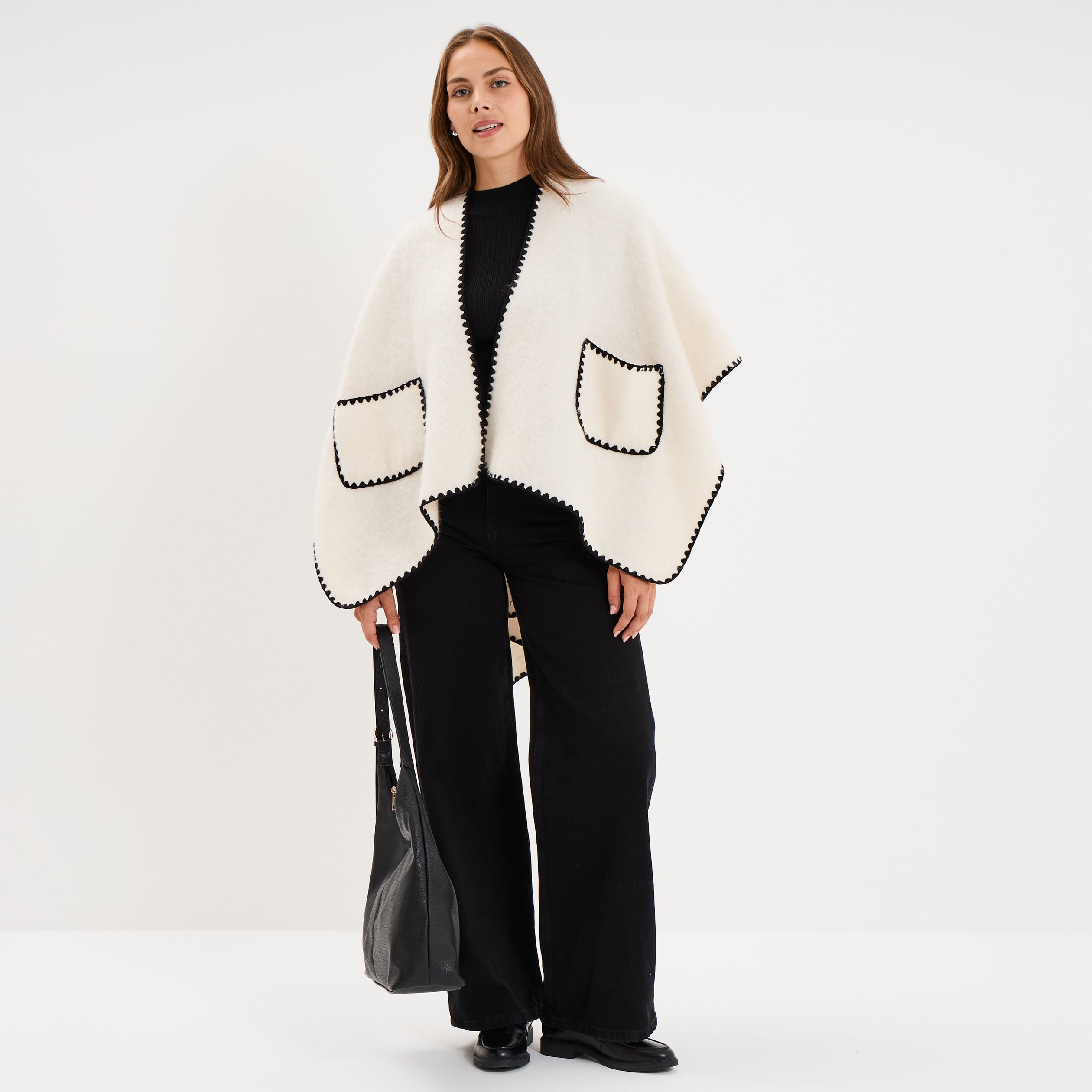 Poncho avec liser&eacute;s contrast&eacute;s ivoire femme