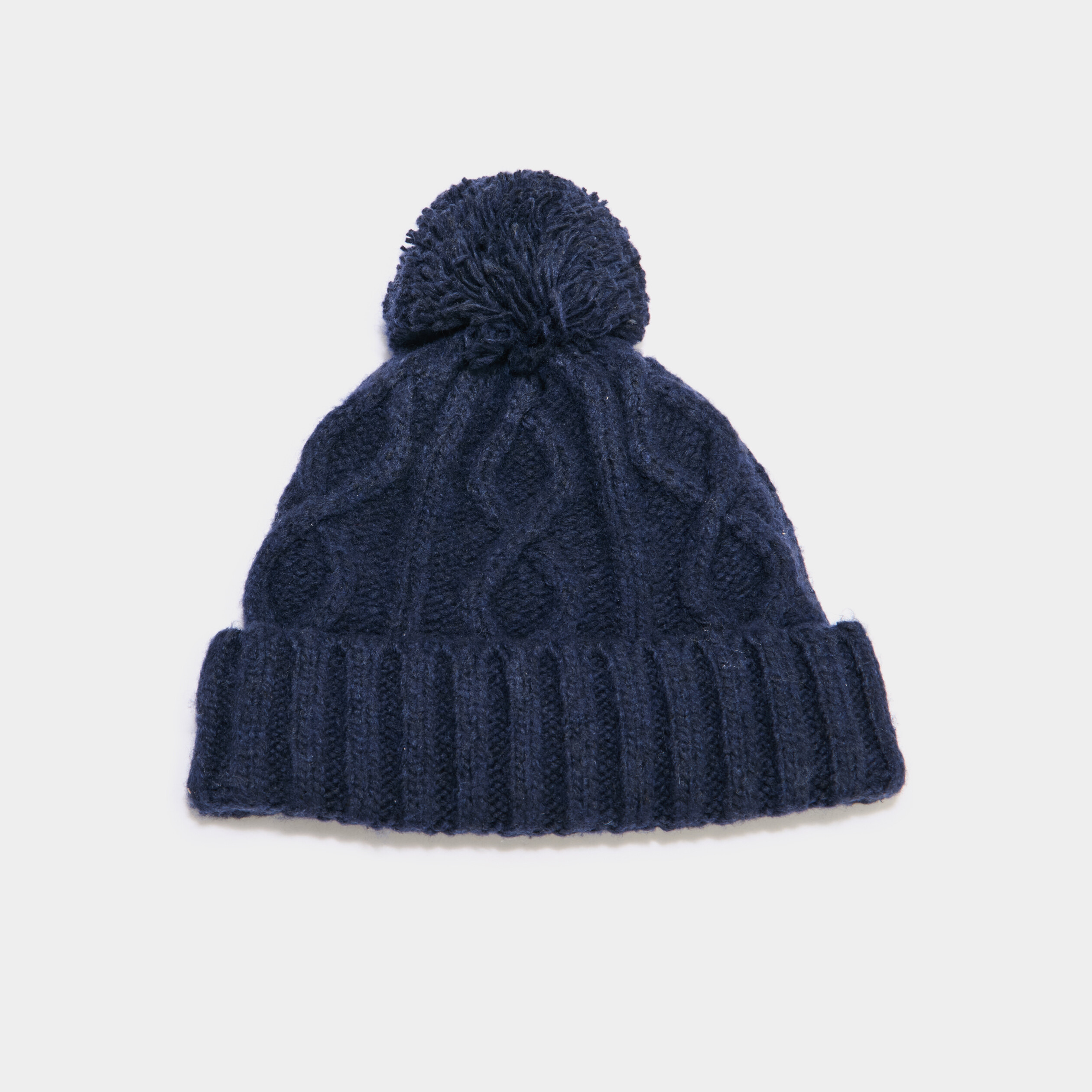 Bonnet &agrave; pompon bleu marine gar&ccedil;on