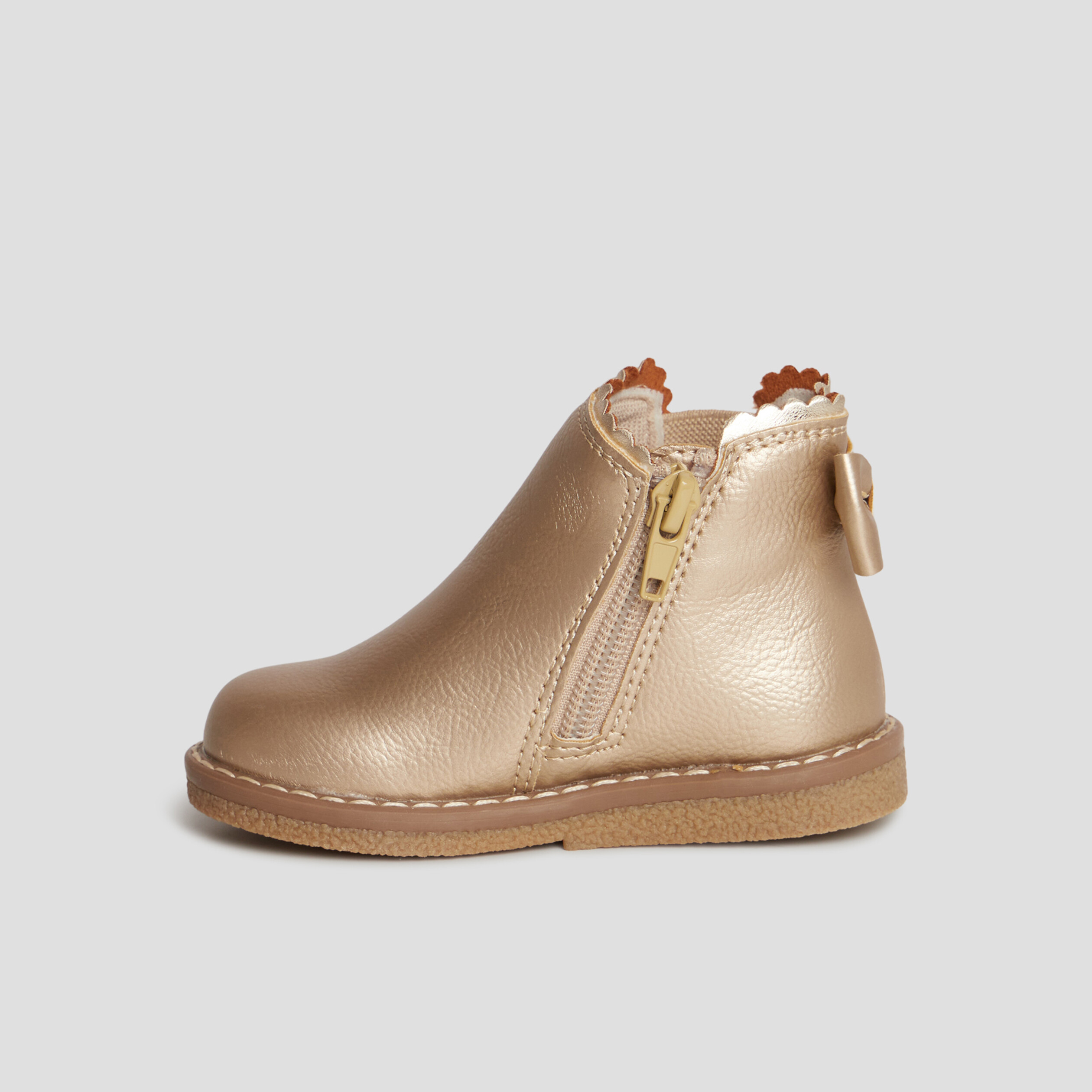 Bottines zipp&eacute;es avec noeud jaune or b&eacute;b&eacute; fille