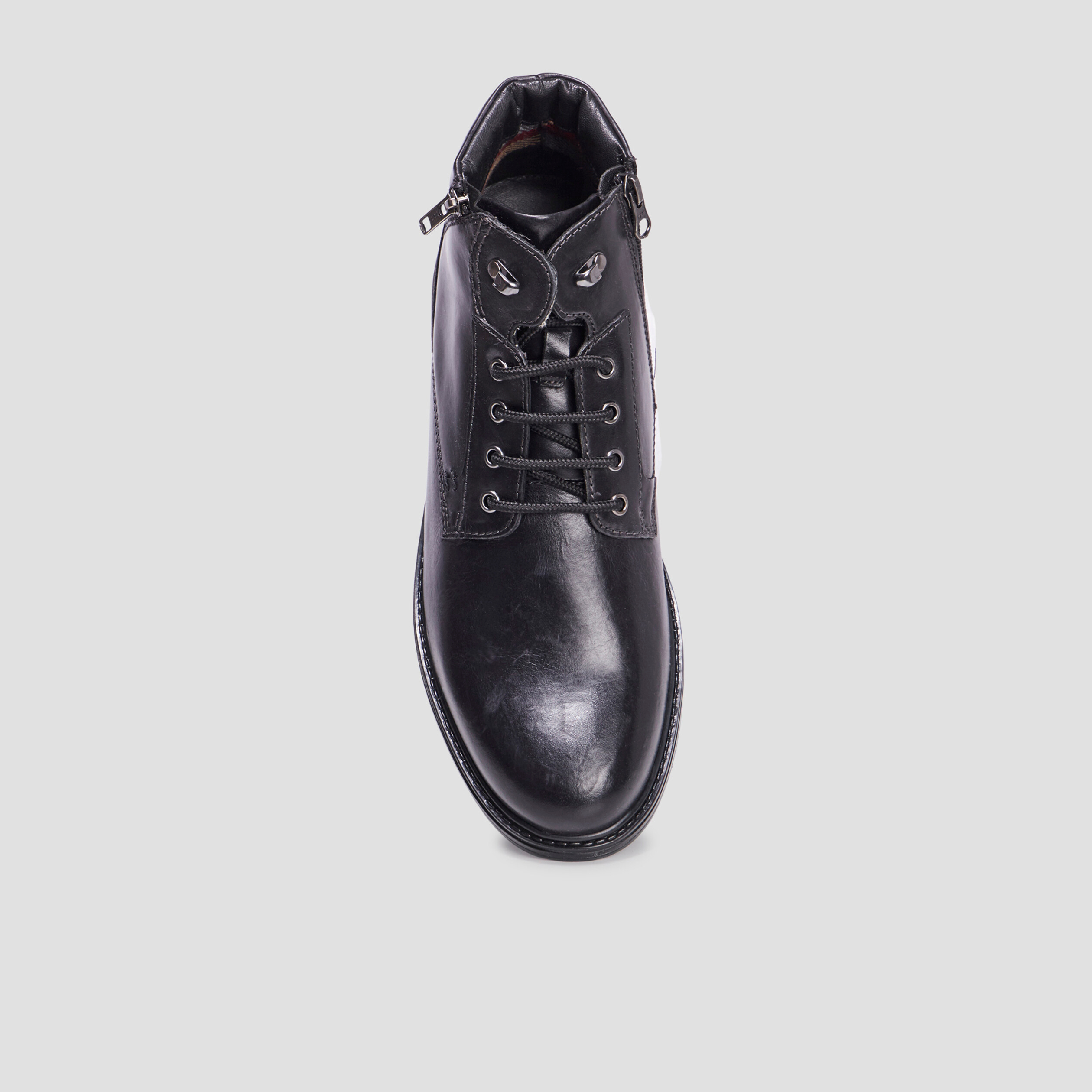 Boots zippées en cuir noir homme
