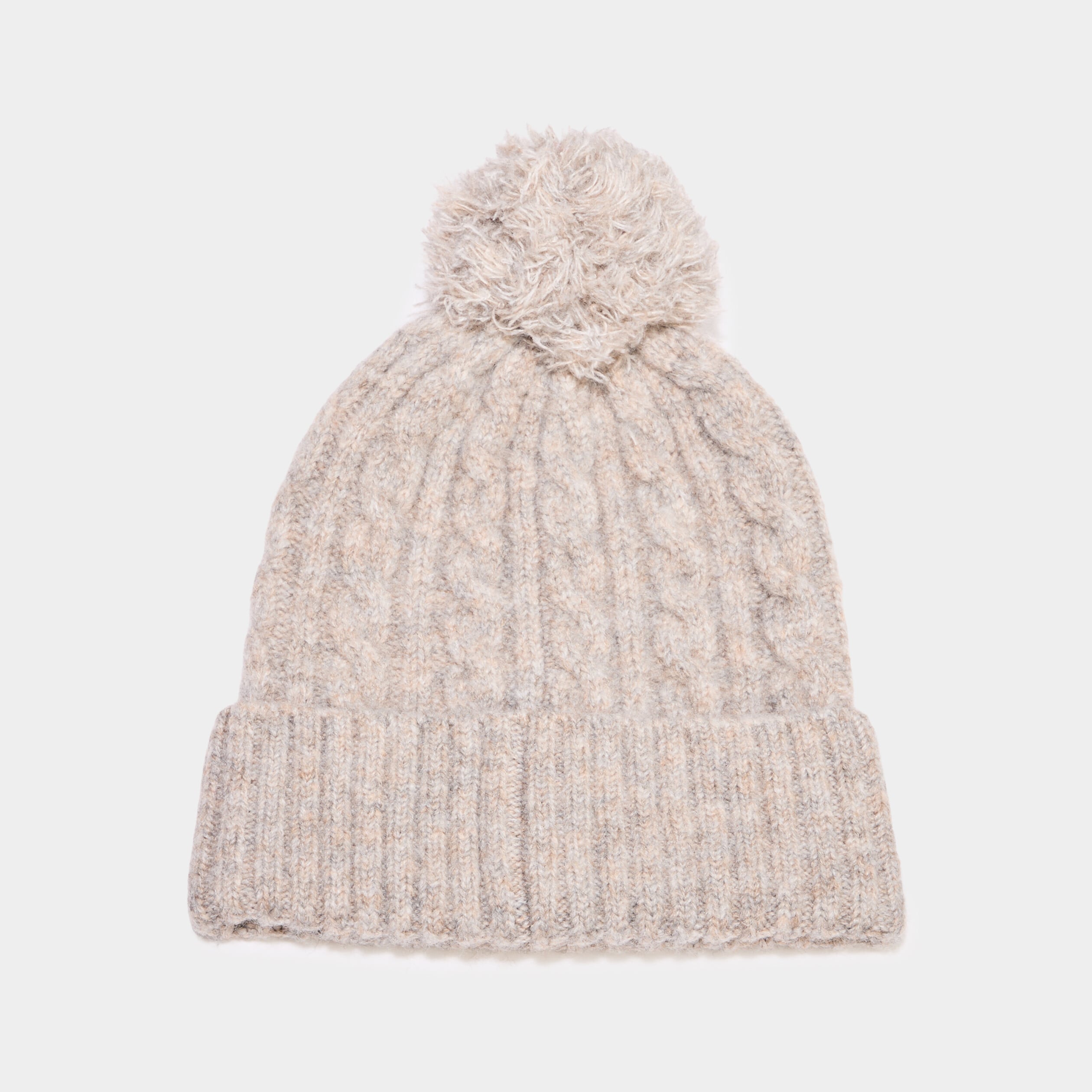 Bonnet &agrave; pompon et torsades beige mixte