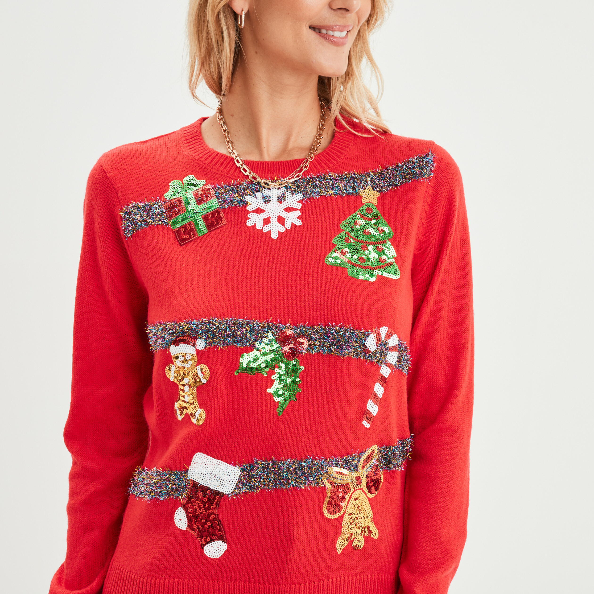 Pull de Noël guirlande et sequins rouge femme