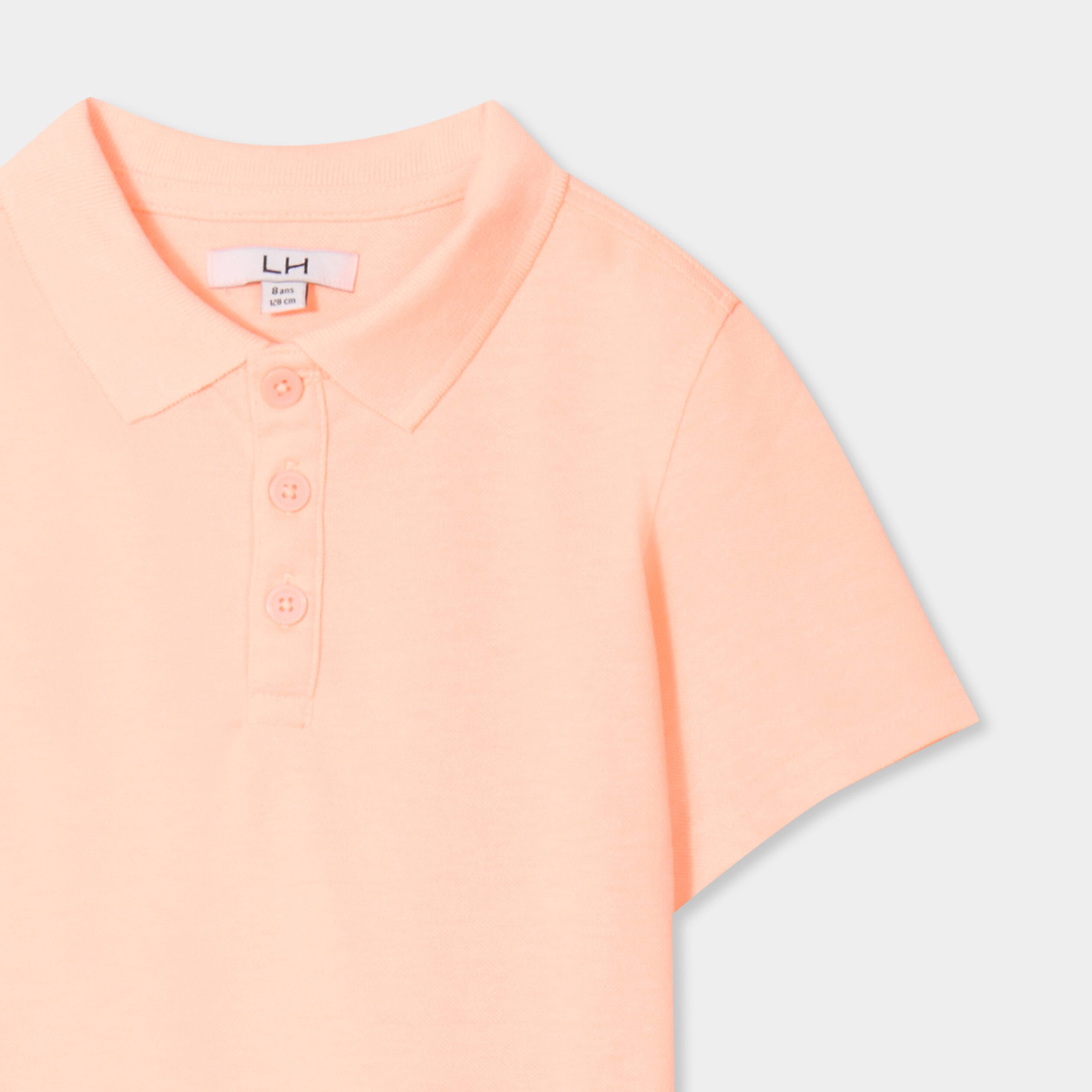 Polo manches courtes &agrave; d&eacute;tail brod&eacute; orange fluo gar&ccedil;on