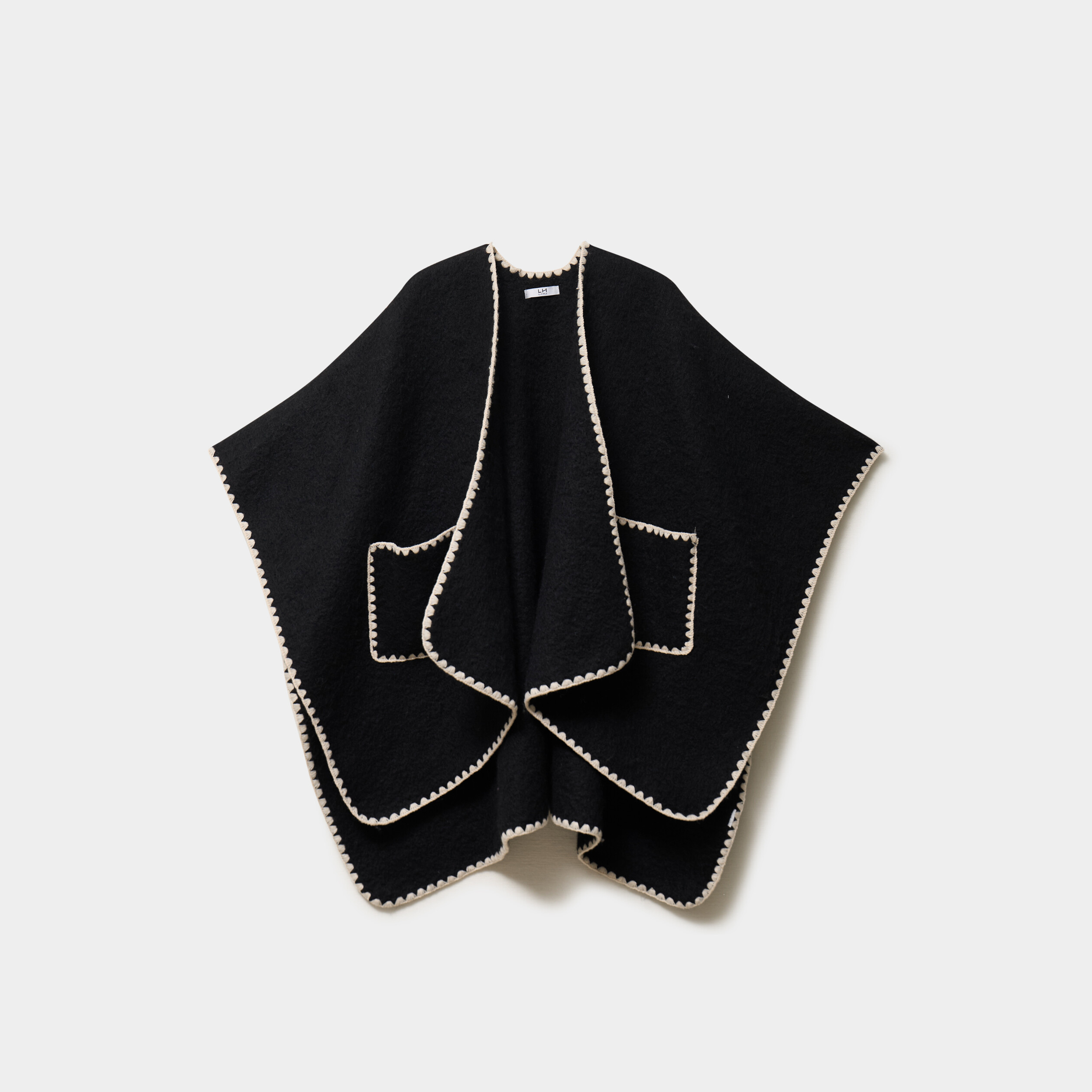 Poncho avec liser&eacute;s contrast&eacute;s noir femme