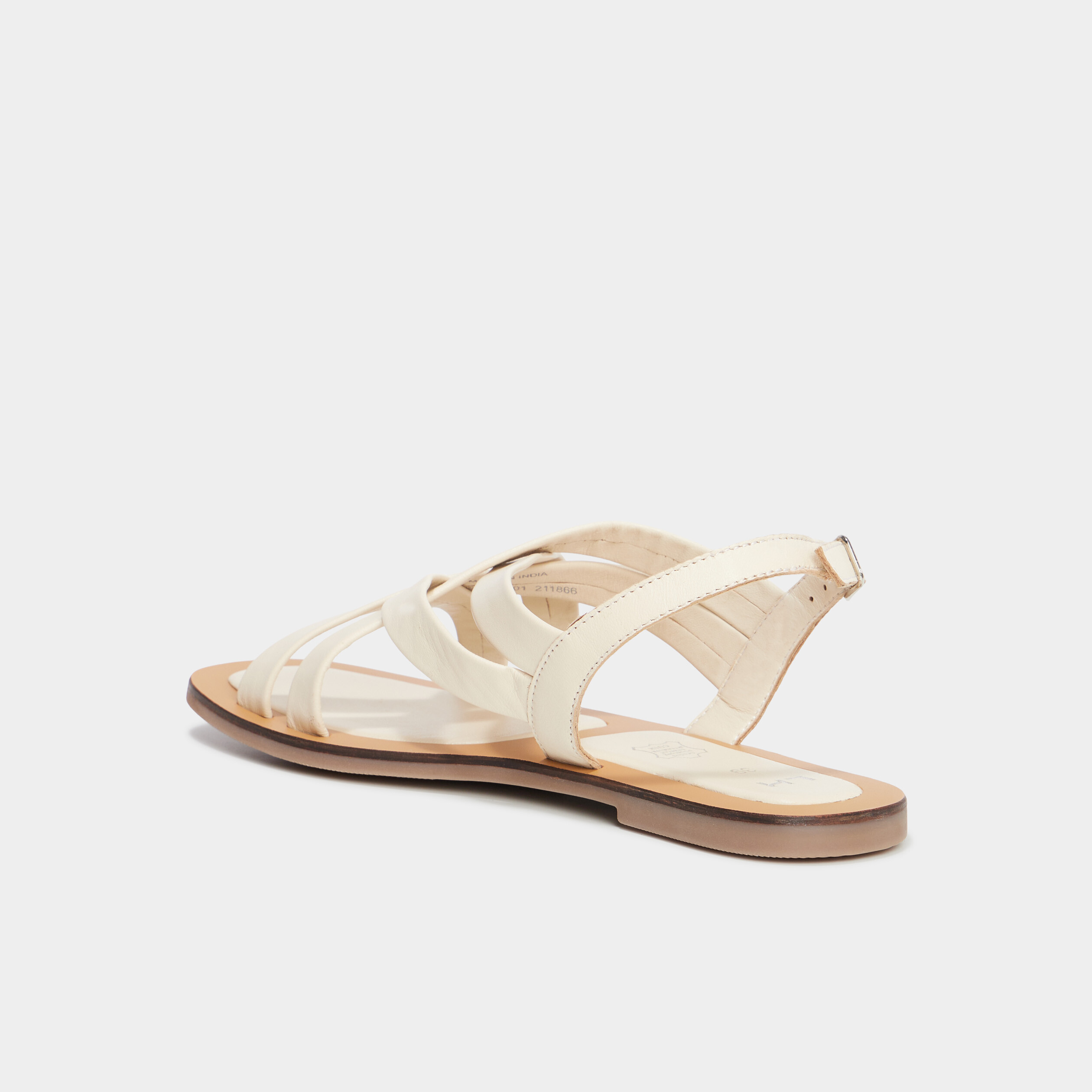 Sandales plates brides crois&eacute;es en cuir blanc femme